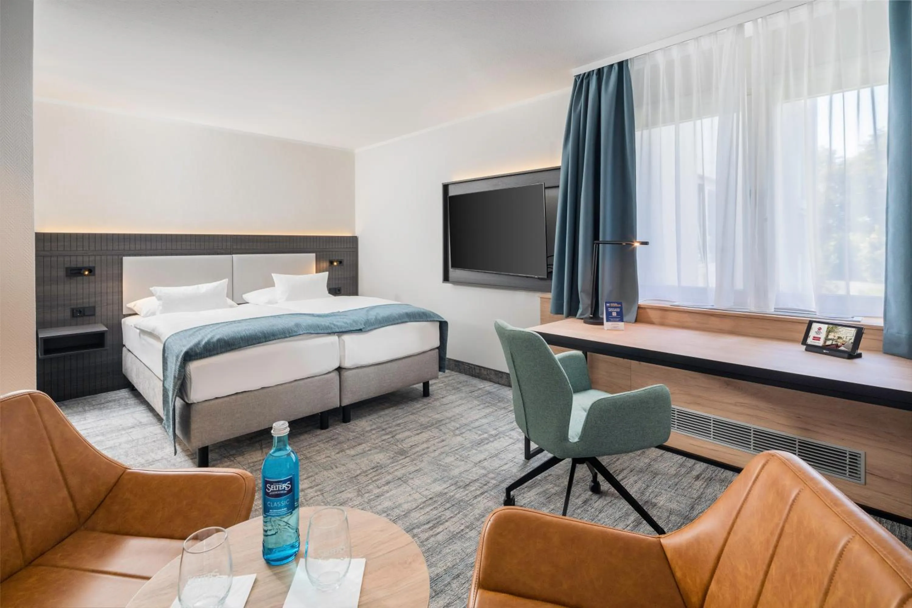 Living room, Bed in Best Western Plus Hotel Fellbach-Stuttgart