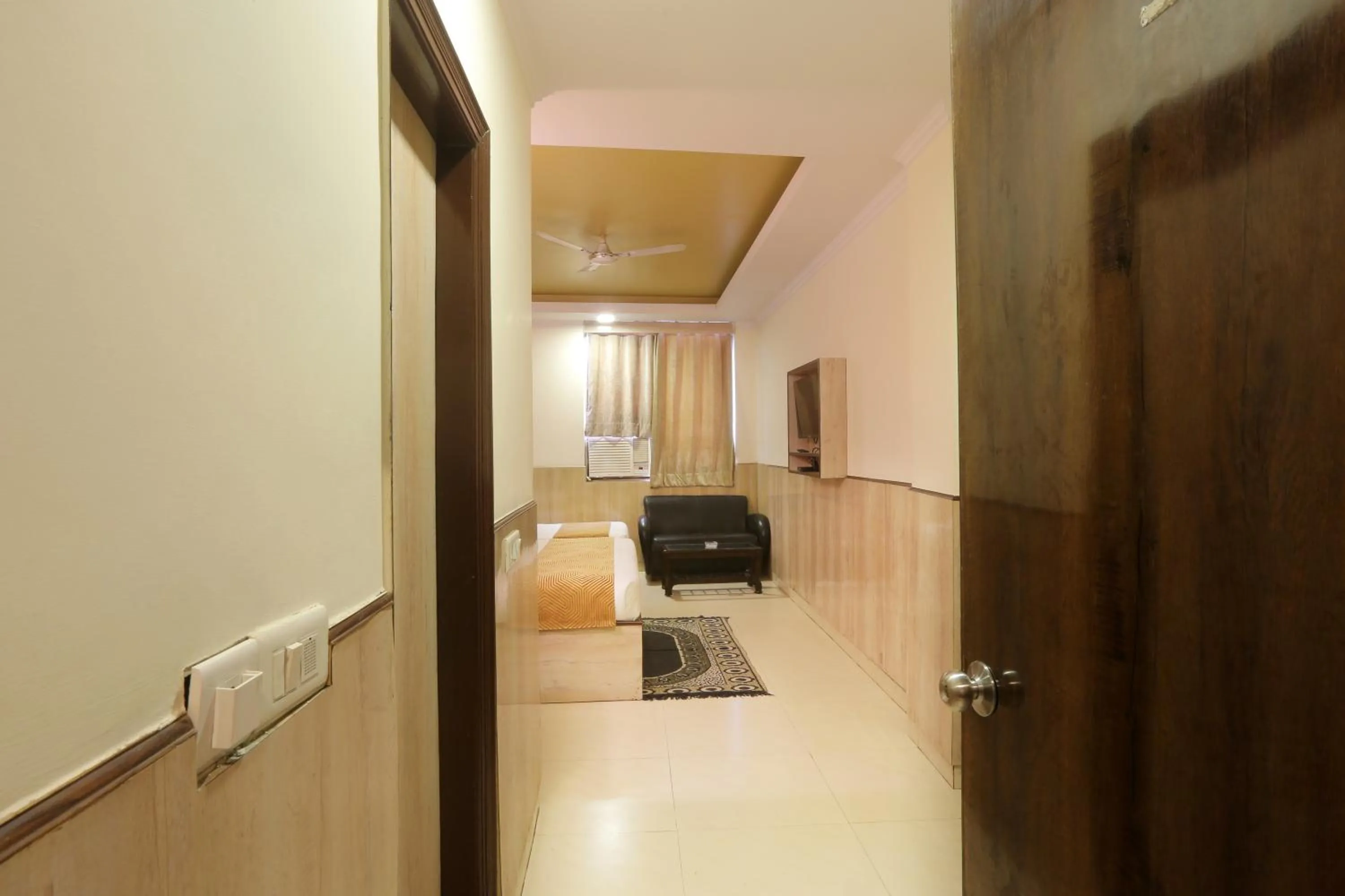 Seating area in Hotel Castle Blue New Delhi Near IGI Airport