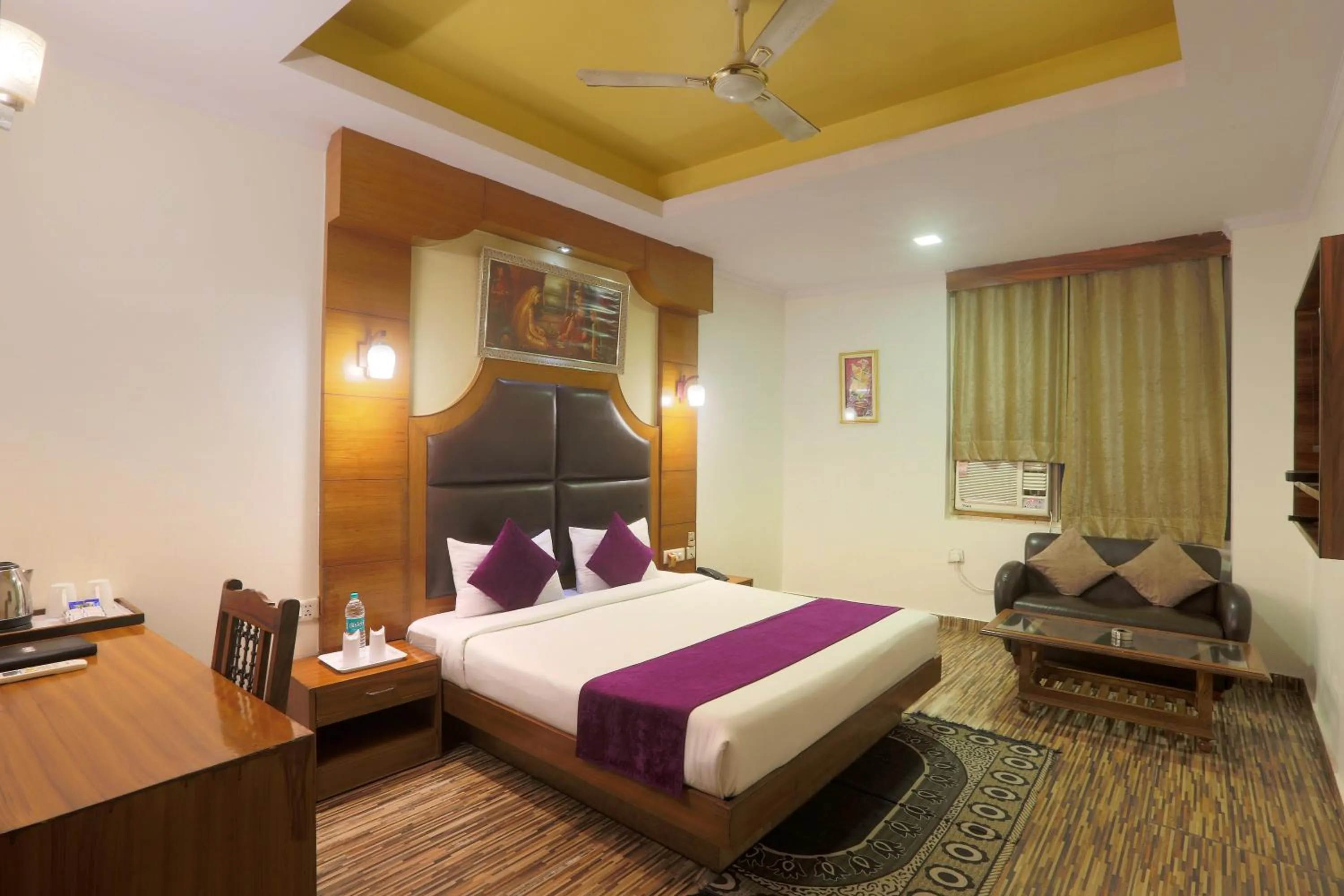 Bedroom in Hotel Castle Blue New Delhi Near IGI Airport