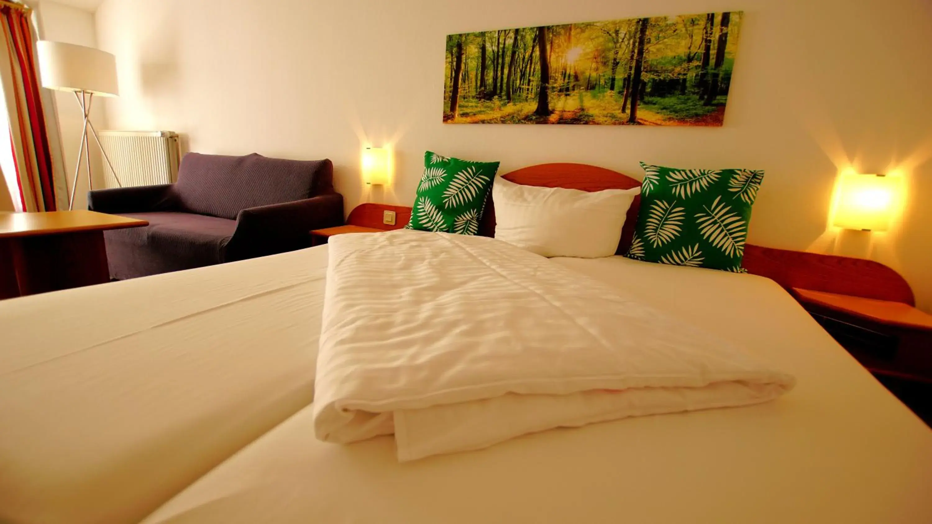 Photo of the whole room, Bed in Hotel Tannenhof Haiger Photo of the whole room, Bed in Hotel Tannenhof Haiger