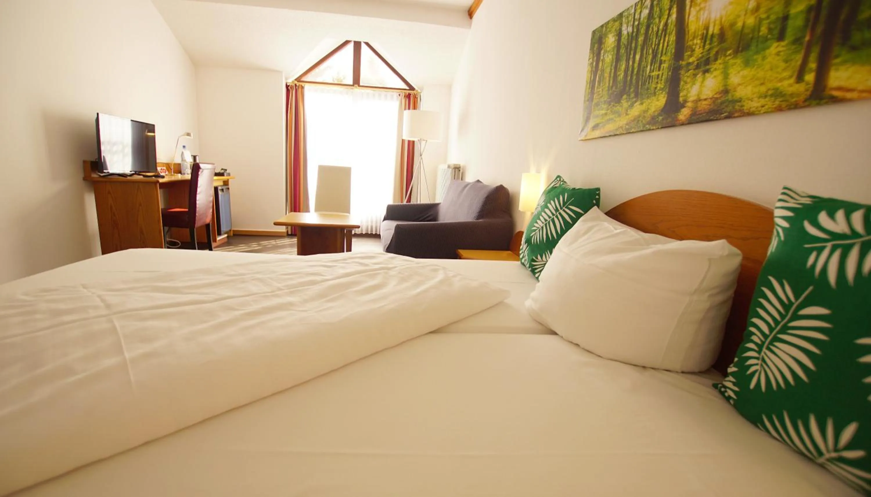 Photo of the whole room, Bed in Hotel Tannenhof Haiger