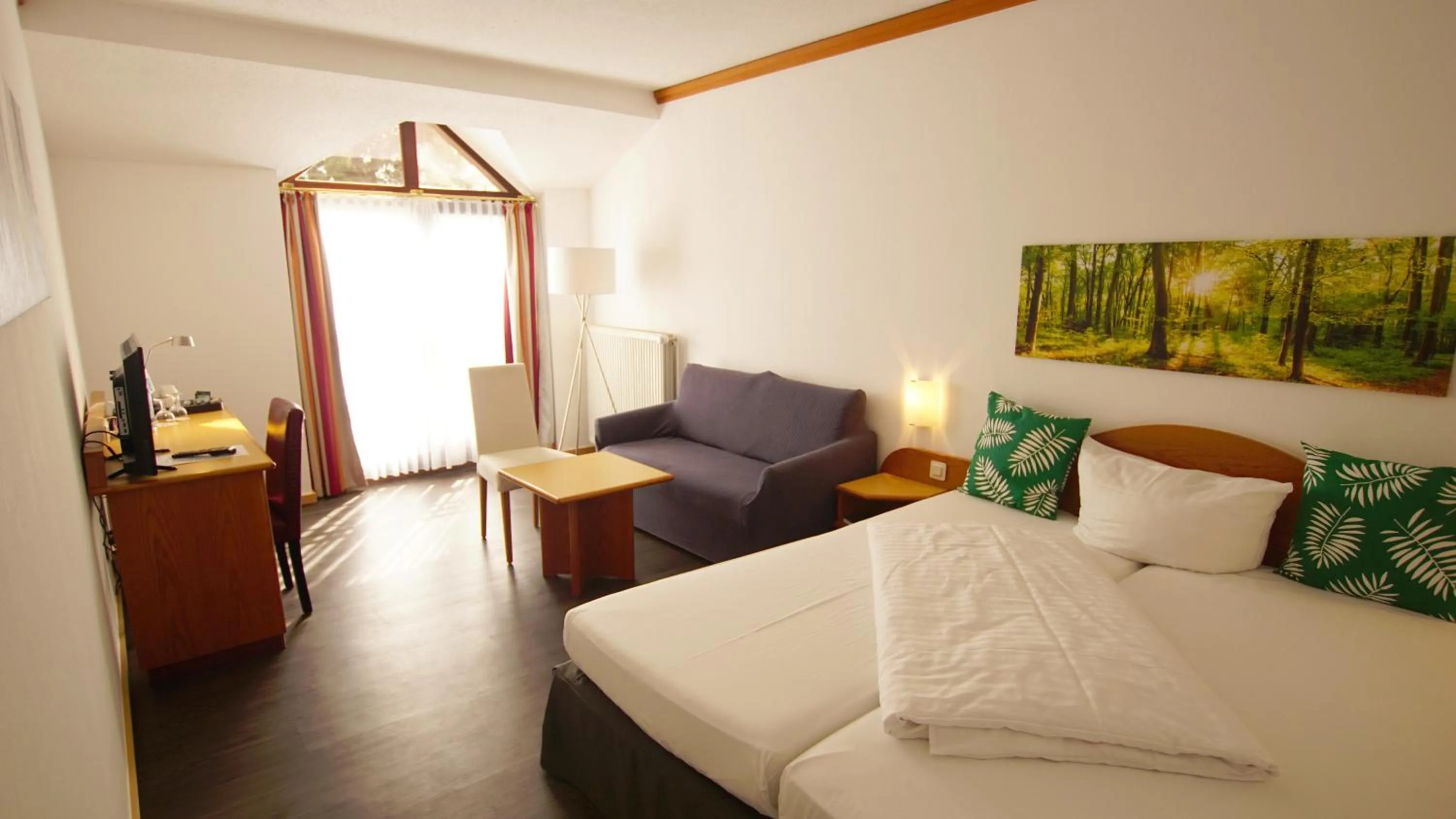 Photo of the whole room, Bed in Hotel Tannenhof Haiger