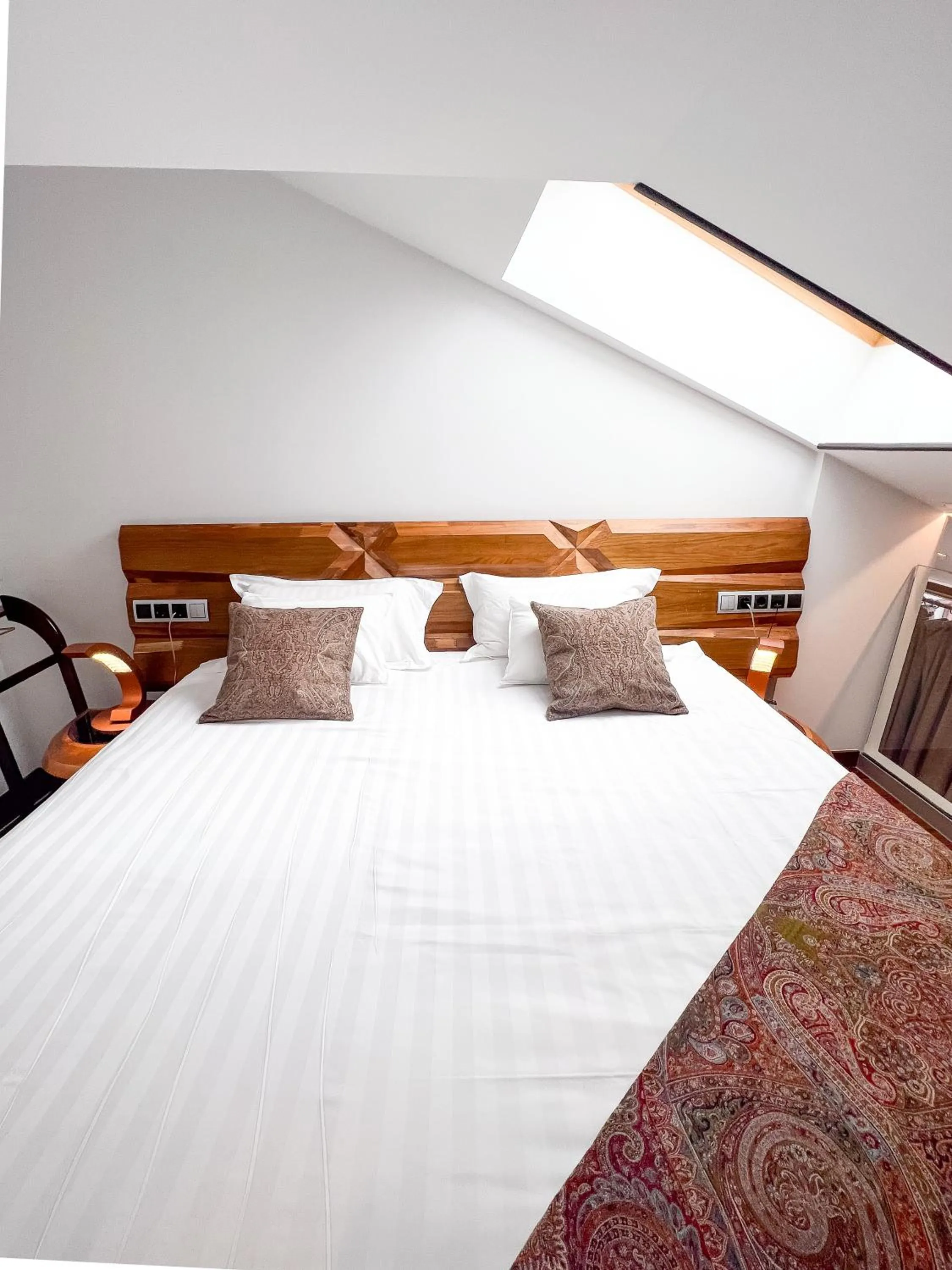 Bed in Anahita Boutique Hotel