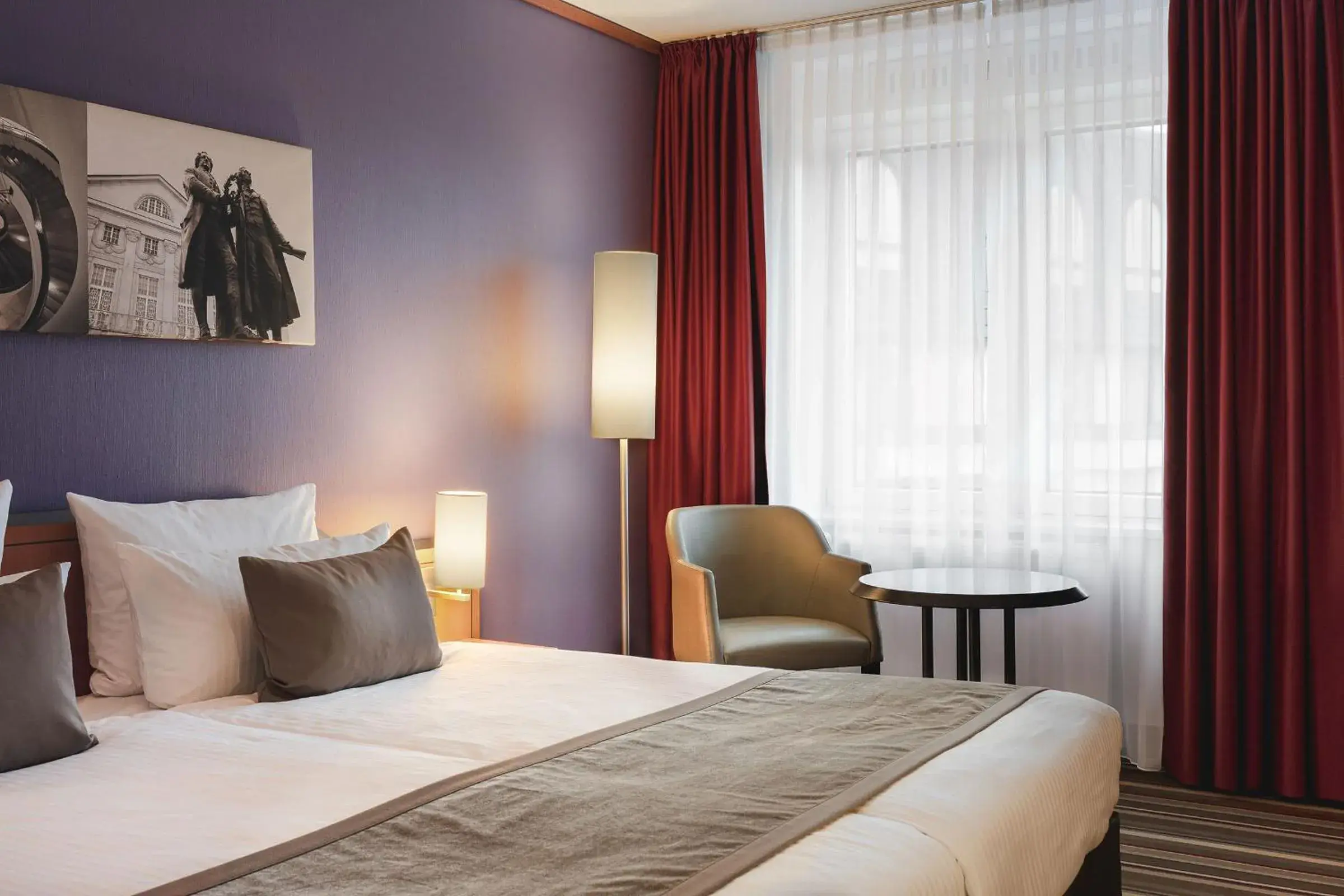 Communal lounge/ TV room, Bed in Leonardo Hotel Weimar Communal lounge/ TV room, Bed in Leonardo Hotel Weimar