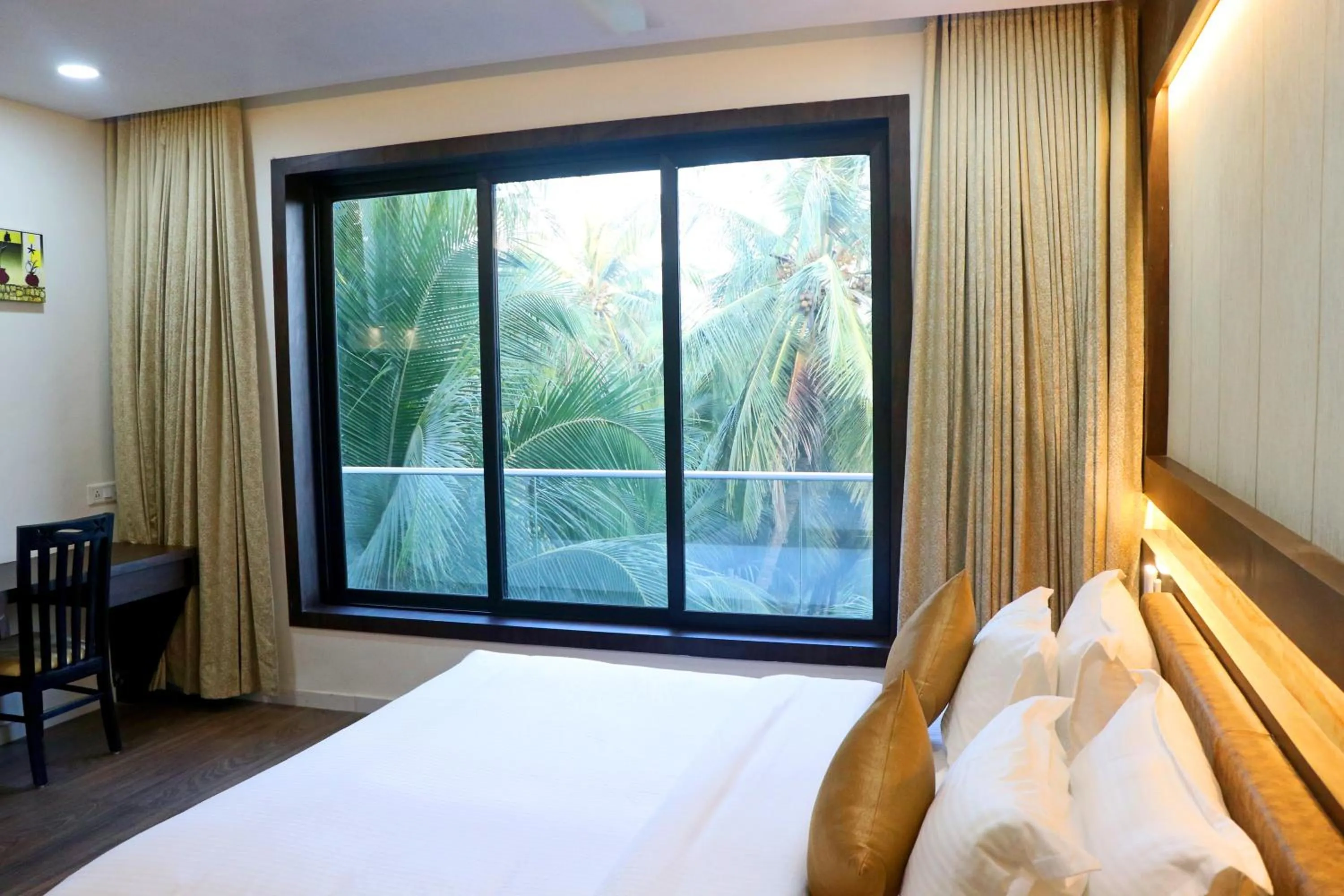 View (from property/room), Bed in THE GRAND ASTORIA SOMANTH by Shivalaya Darshanam