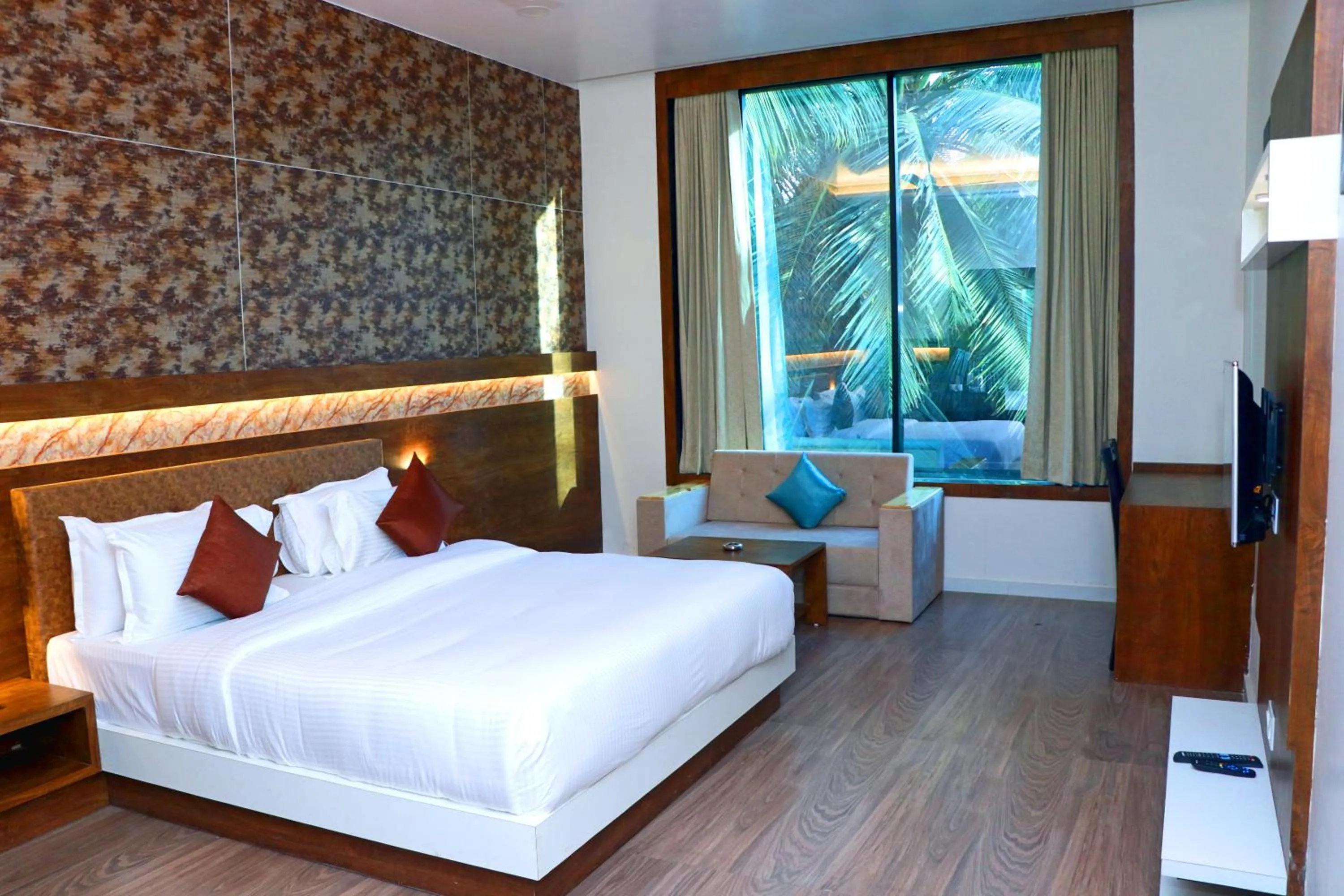 Garden view, Bed in THE GRAND ASTORIA SOMANTH by Shivalaya Darshanam