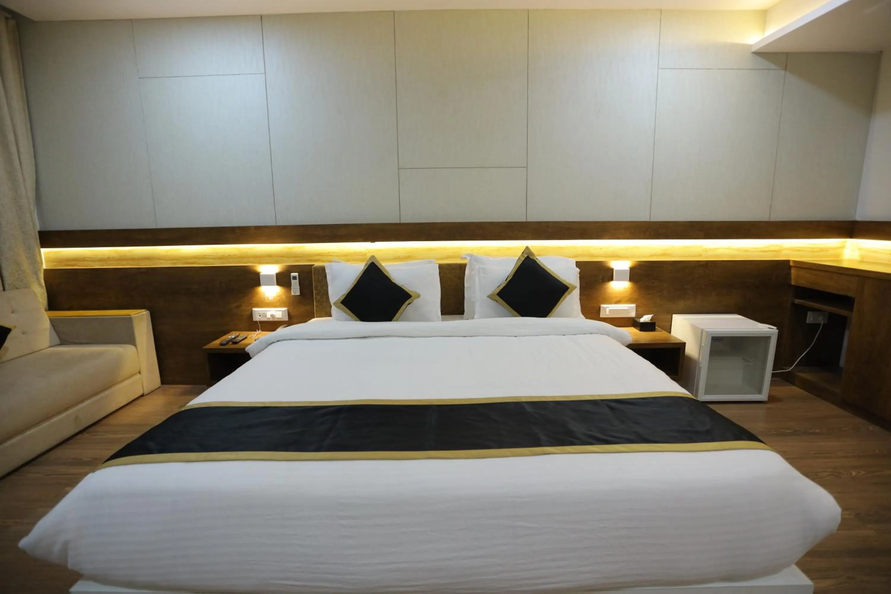 Bed in THE GRAND ASTORIA SOMANTH by Shivalaya Darshanam