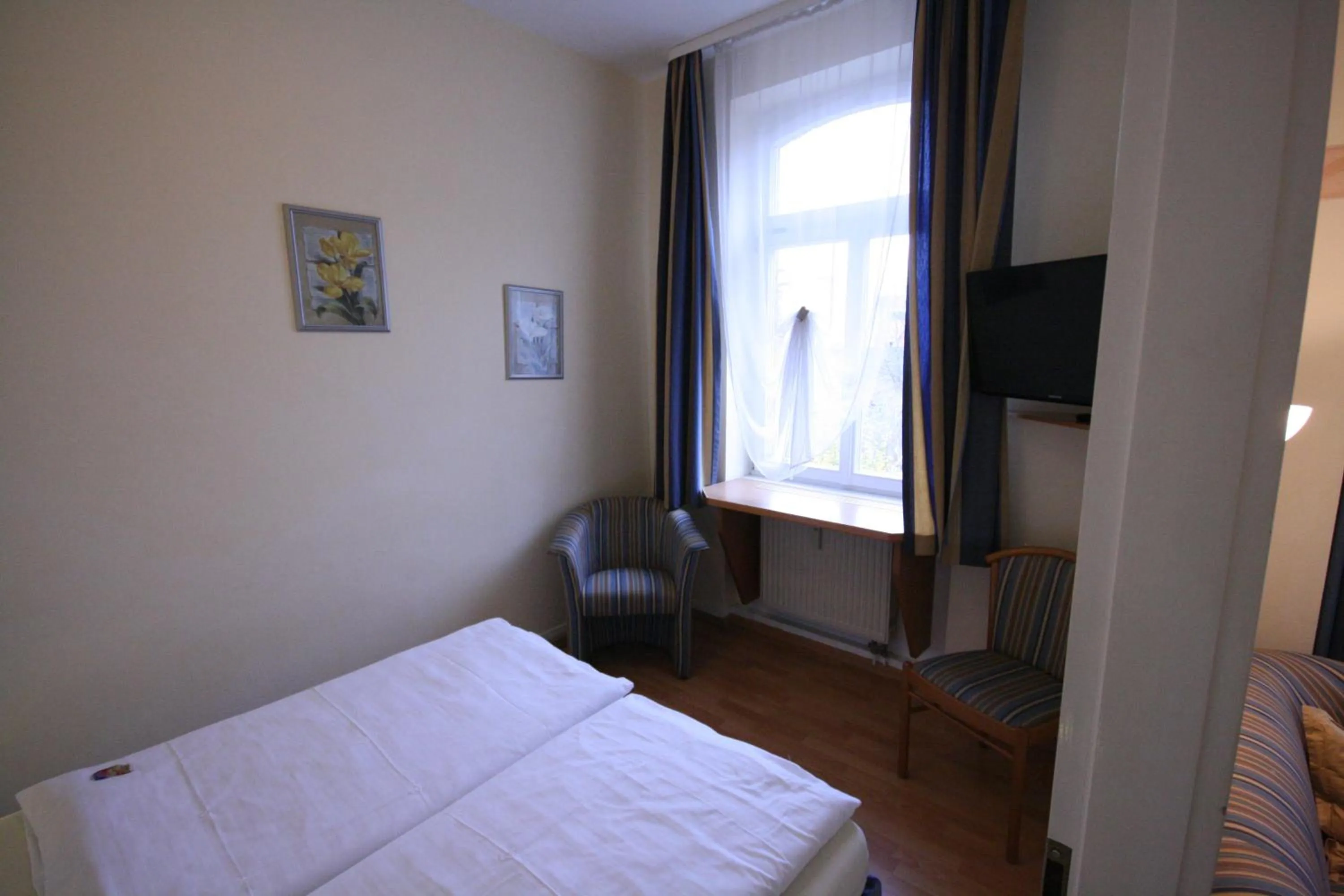 Photo of the whole room, Bed in Altstadt Hotel