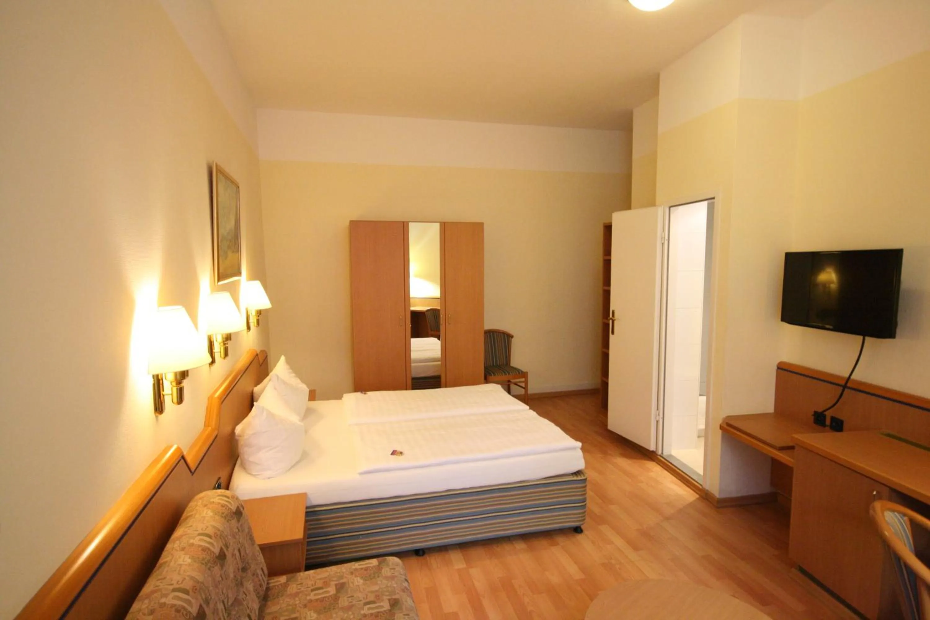 Photo of the whole room, Bed in Altstadt Hotel