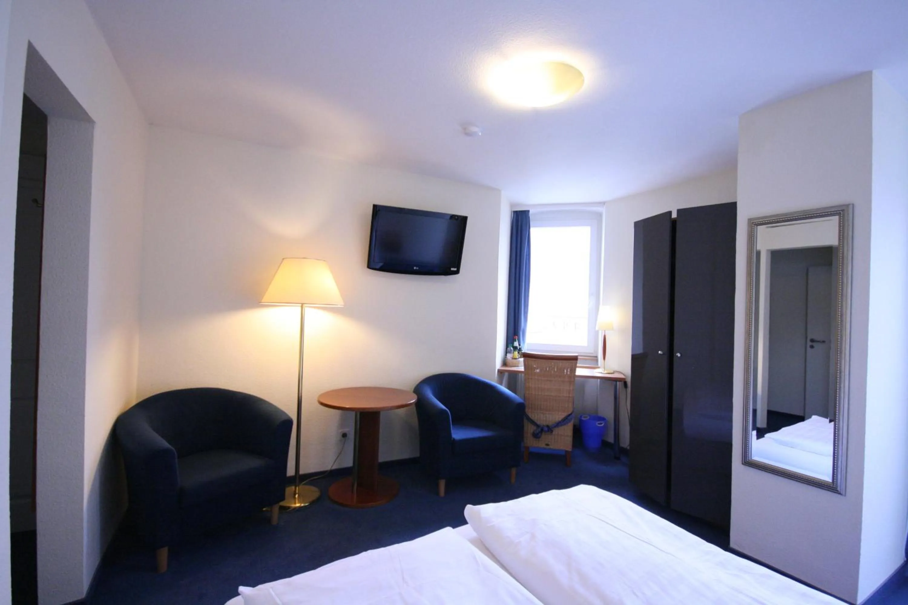 Photo of the whole room, Bed in Altstadt Hotel