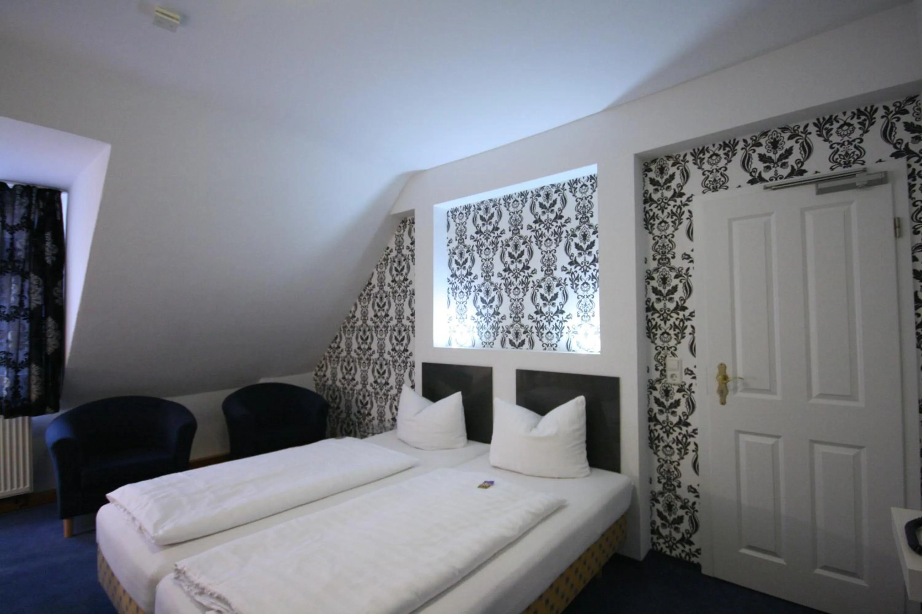Photo of the whole room, Bed in Altstadt Hotel