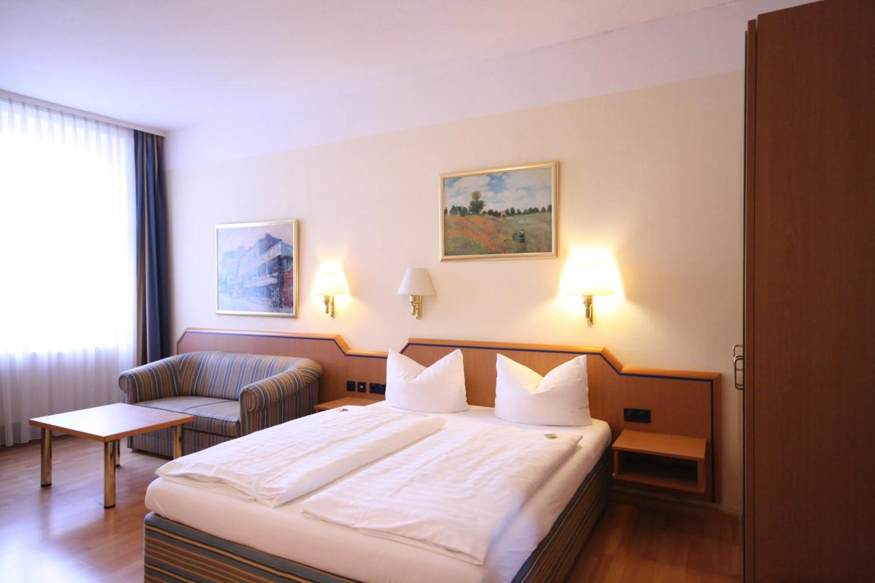 Photo of the whole room, Bed in Altstadt Hotel