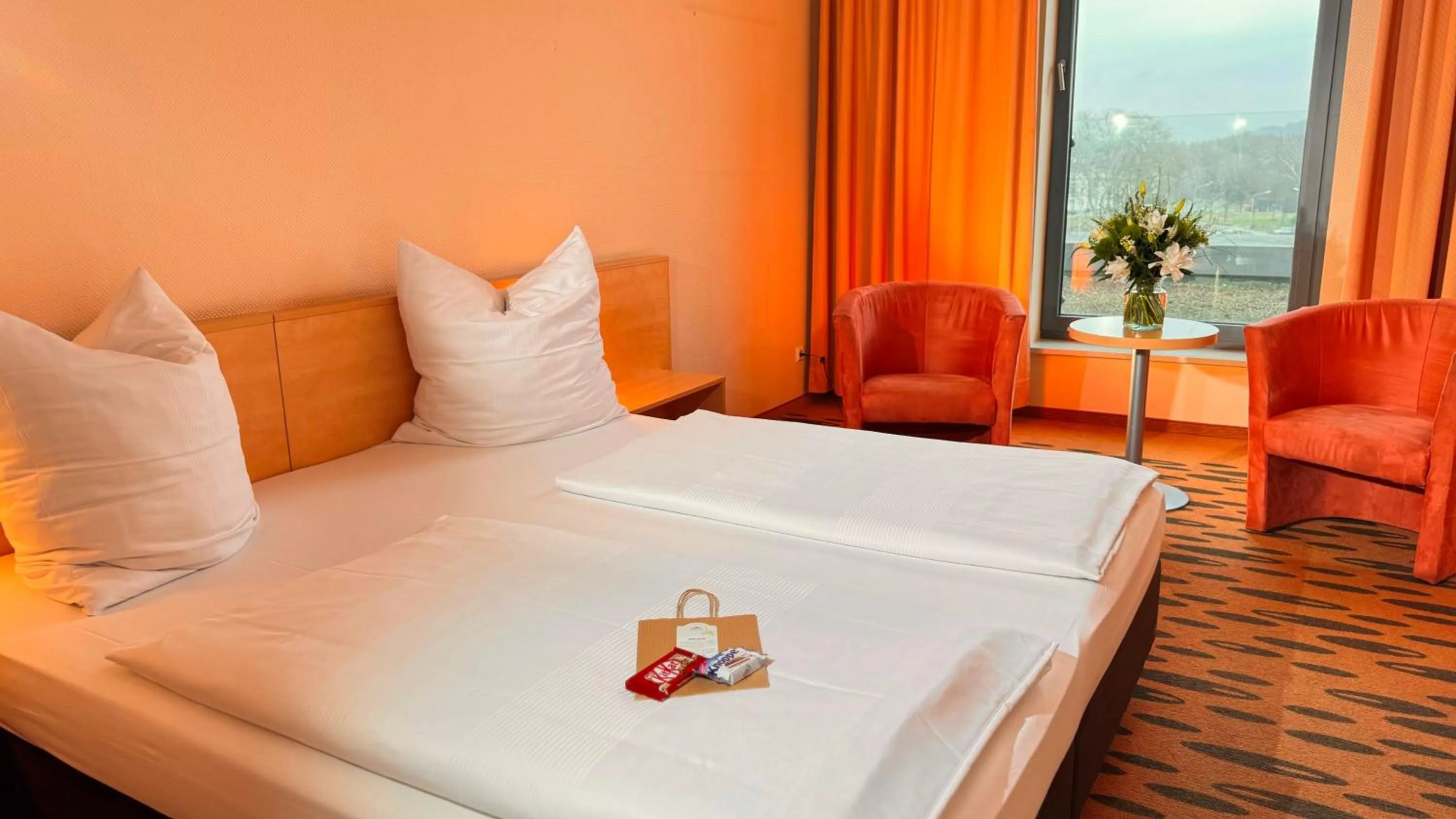 Photo of the whole room, Bed in Hotel Rhein-Ruhr Bottrop