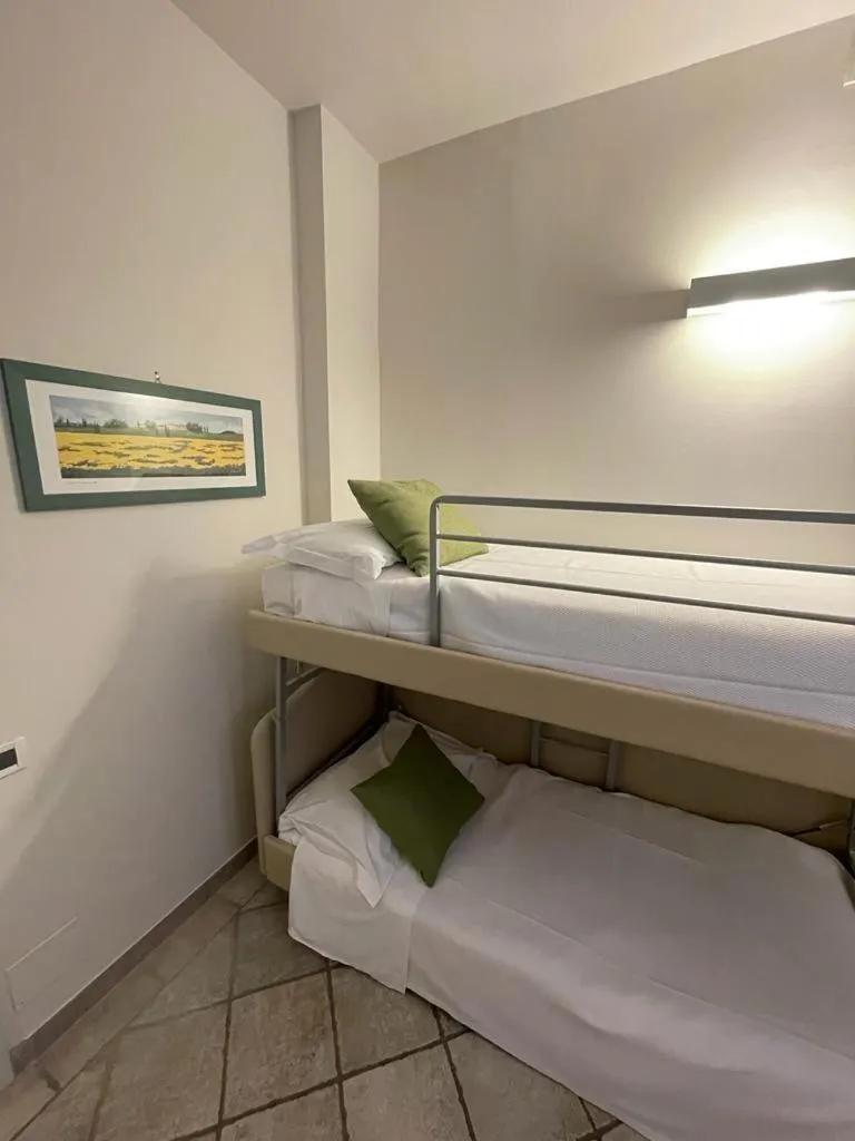 Quadruple Room with Balcony in Hotel Le Colline