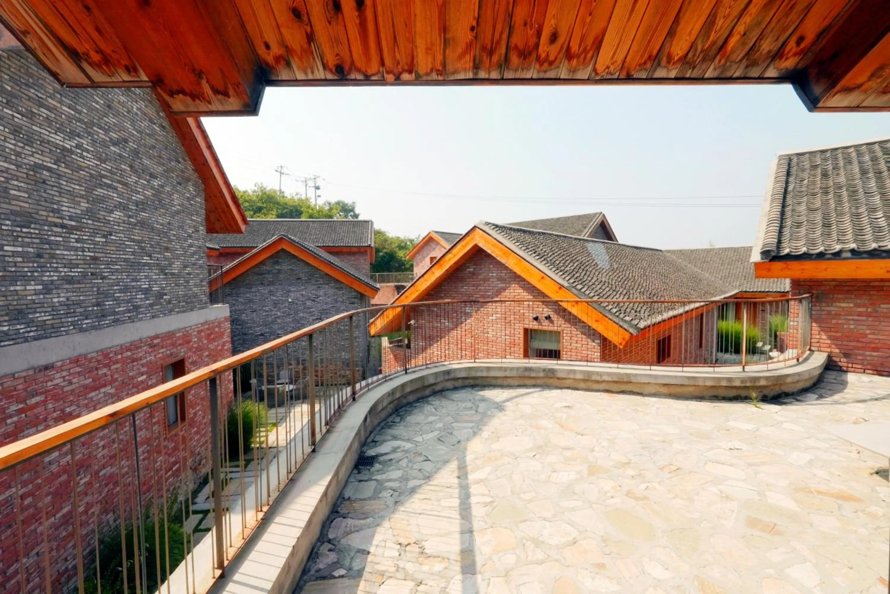 Property building in Sansa Village Boutique Hotel at Mutianyu Great Wall Adjoin to Mutianyu Great Wall - Room with the View of Great Wall - Jacuzzi with the View of Great Wall - Vehicle Shuttle Service - International Catering - SPA& Nail Beauty Facilities