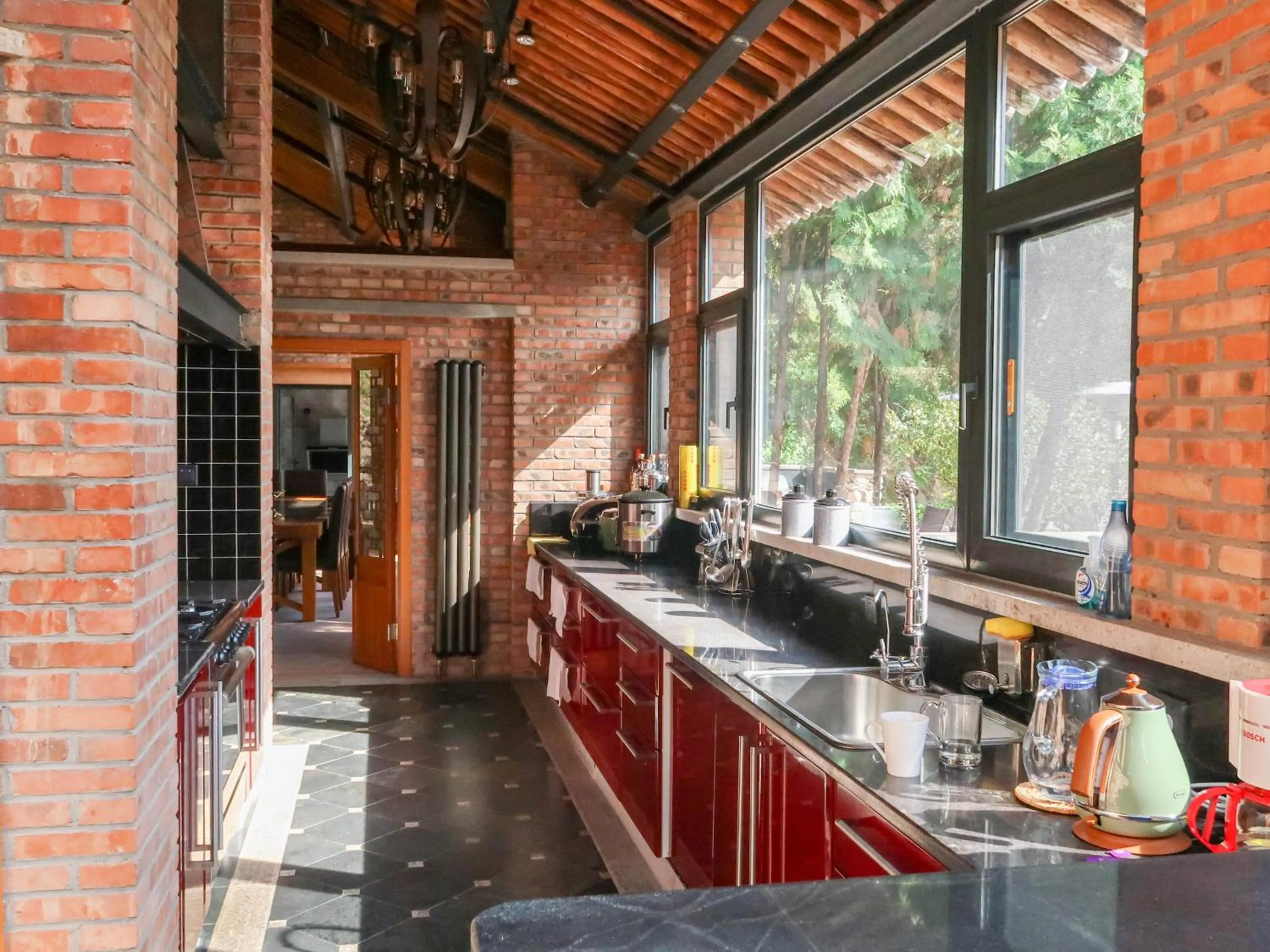 Kitchen or kitchenette in Sansa Village Boutique Hotel at Mutianyu Great Wall Adjoin to Mutianyu Great Wall - Room with the View of Great Wall - Jacuzzi with the View of Great Wall - Vehicle Shuttle Service - International Catering - SPA& Nail Beauty Facilities