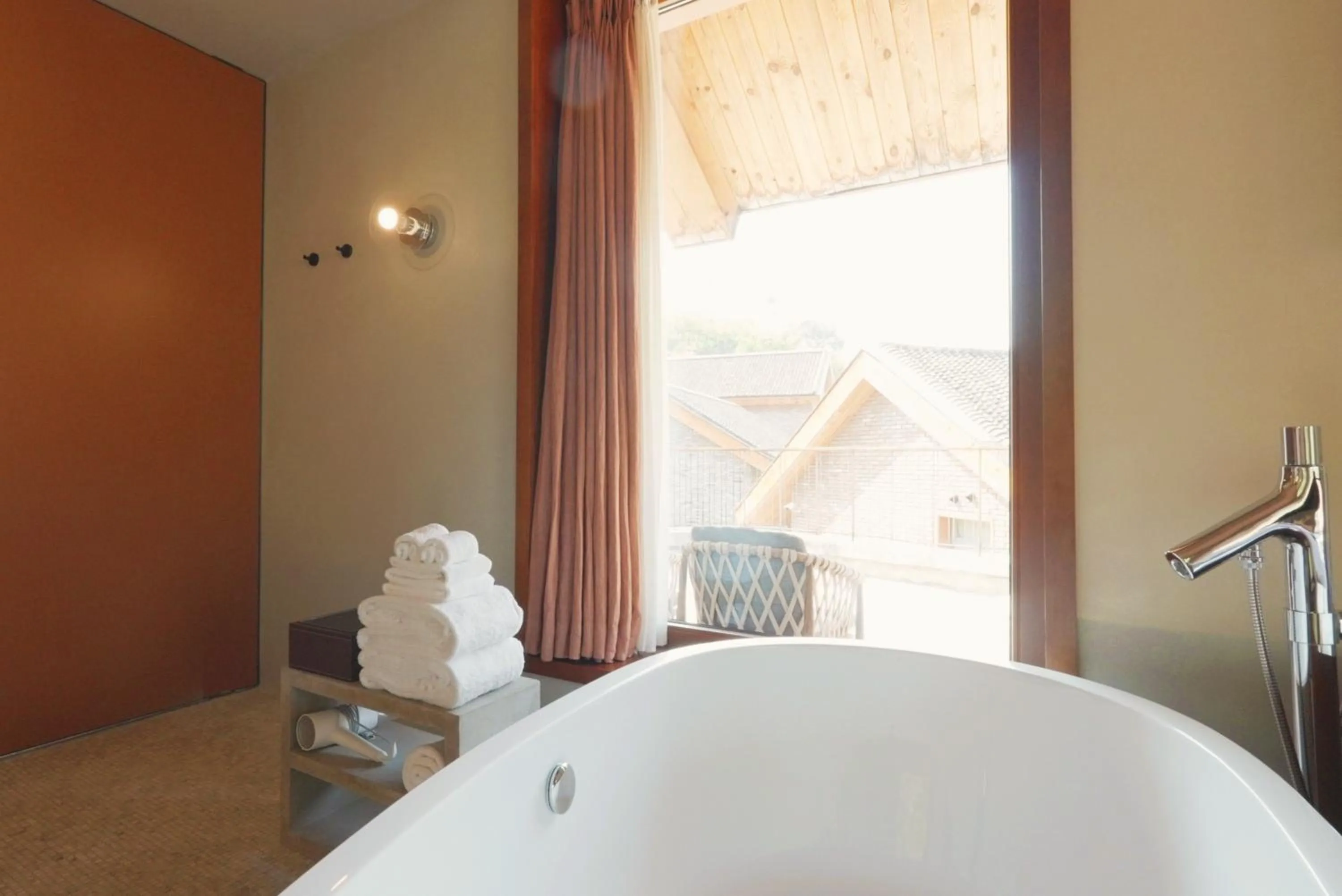 Bathroom in Sansa Village Boutique Hotel at Mutianyu Great Wall Adjoin to Mutianyu Great Wall - Room with the View of Great Wall - Jacuzzi with the View of Great Wall - Vehicle Shuttle Service - International Catering - SPA& Nail Beauty Facilities