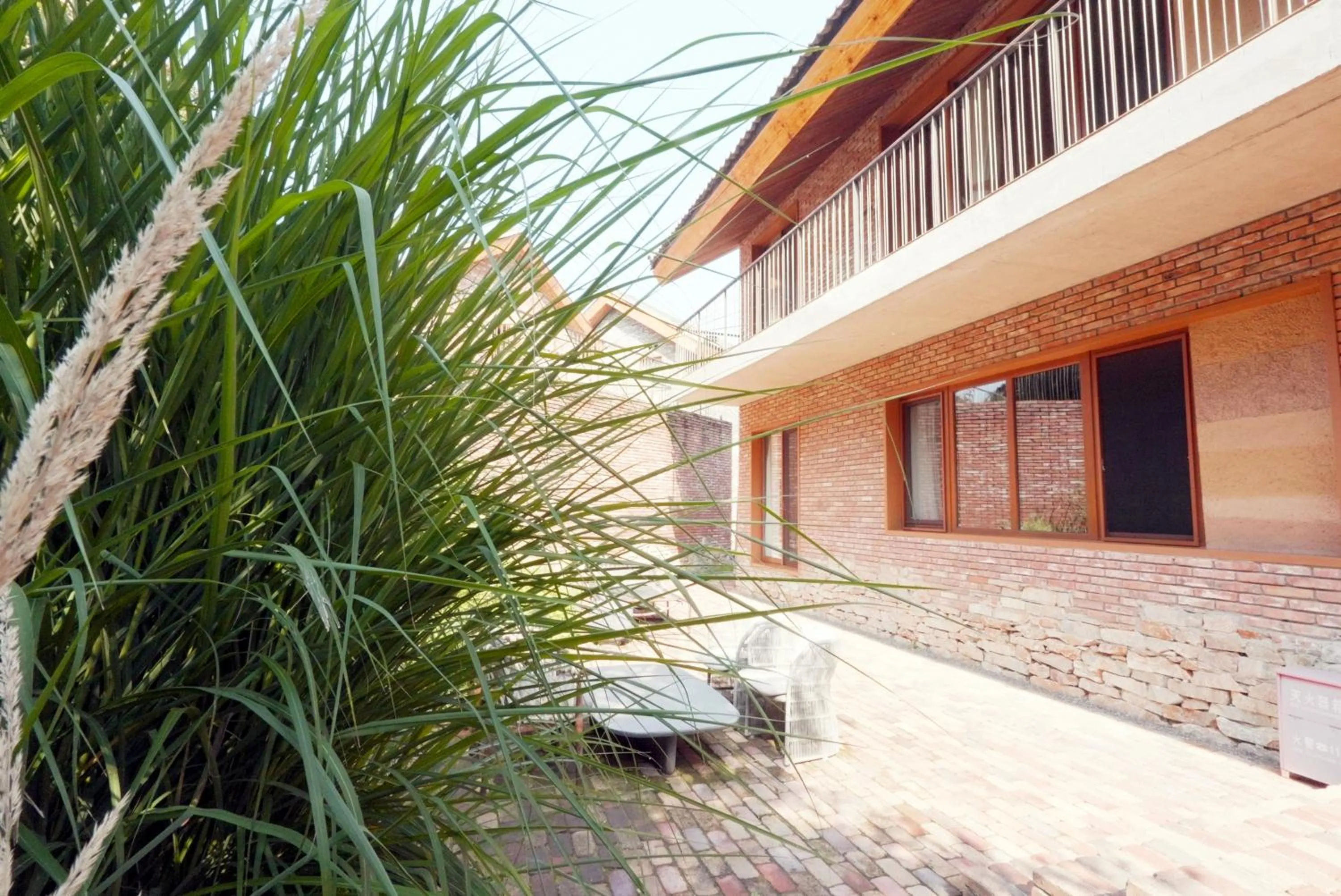 Garden view in Sansa Village Boutique Hotel at Mutianyu Great Wall Adjoin to Mutianyu Great Wall - Room with the View of Great Wall - Jacuzzi with the View of Great Wall - Vehicle Shuttle Service - International Catering - SPA& Nail Beauty Facilities