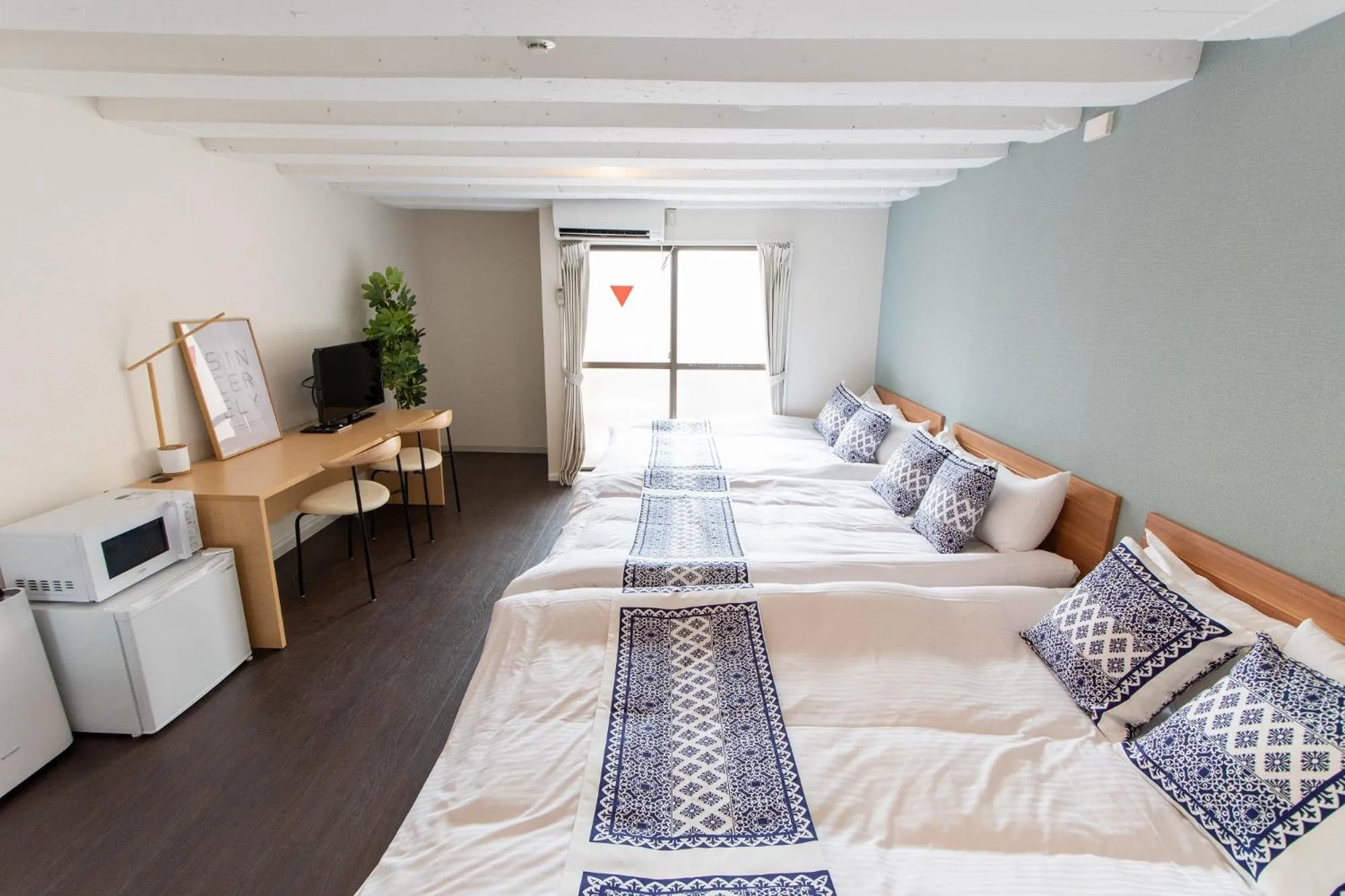 Bed in LUANAHOTEL IN NAKANO