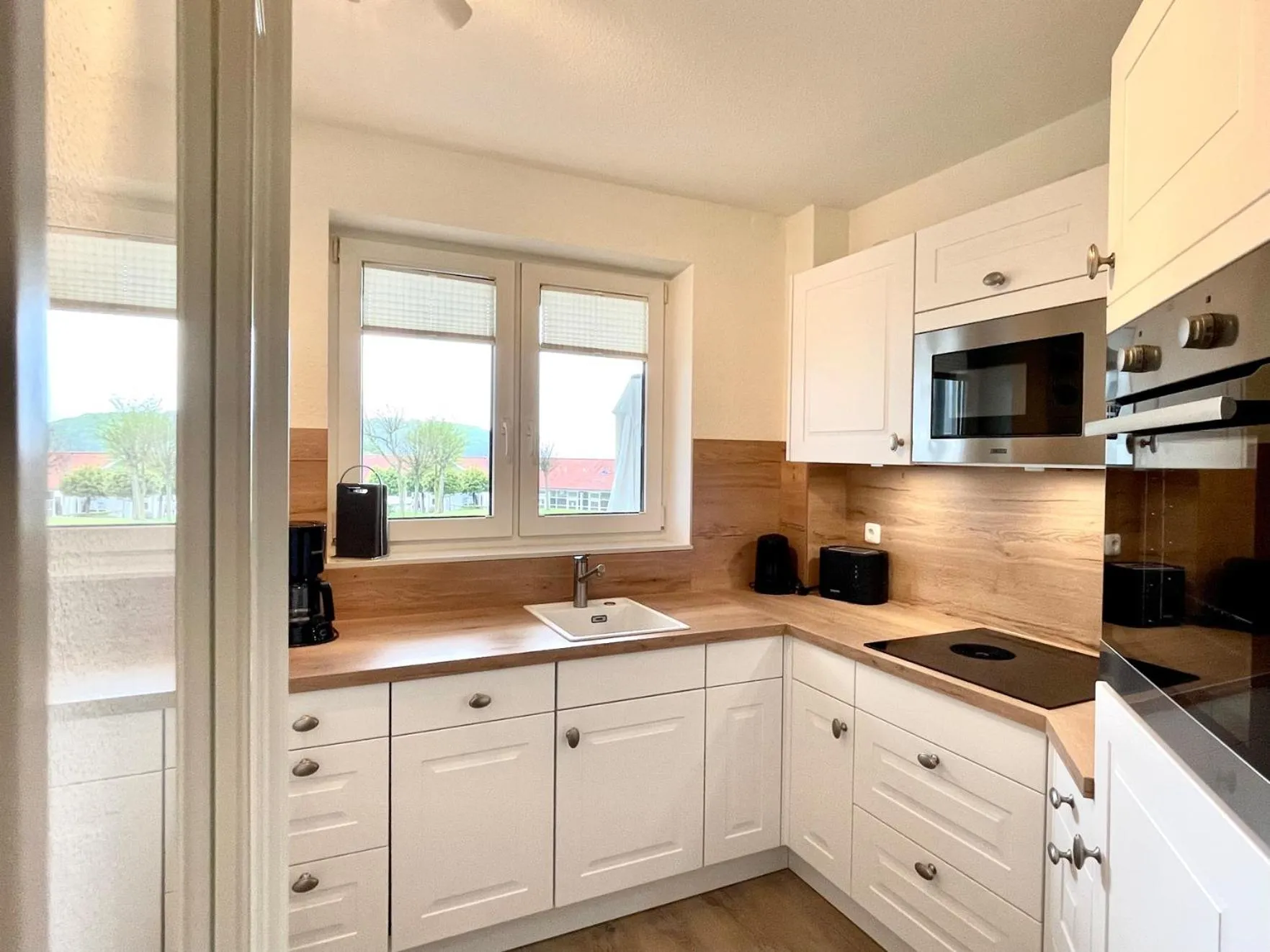 Kitchen or kitchenette in Strandhotel Glücksburg