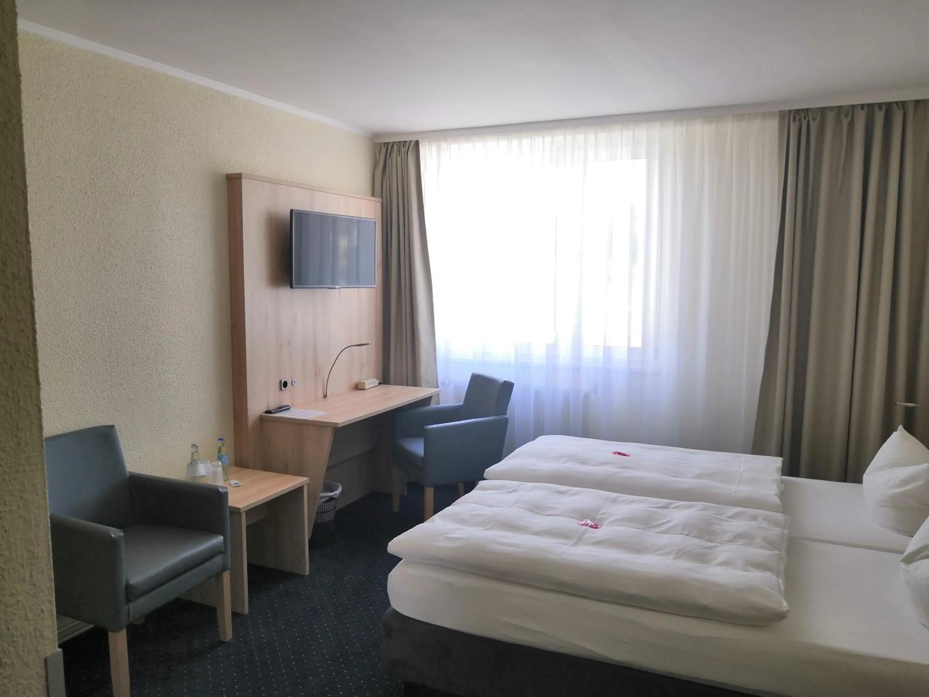 Photo of the whole room, Bed in Kurhotel Sassnitz - das alte Seemannsheim