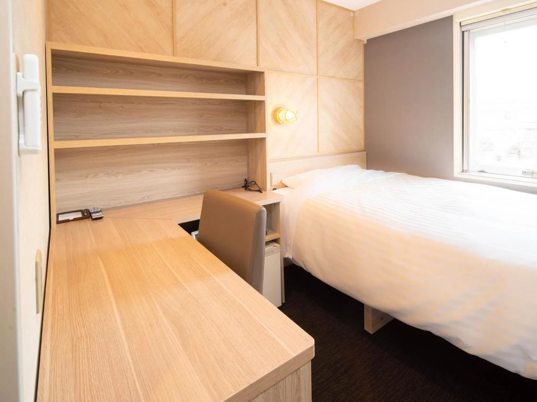 Bed in Super Hotel Nagaizumi Numazu Inter