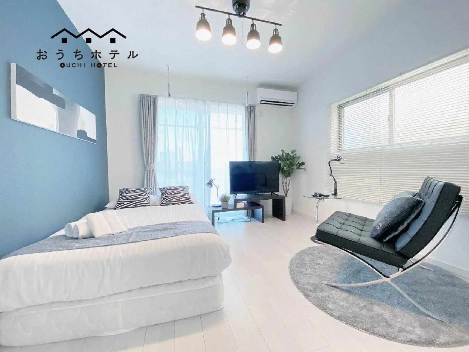 Bed in OUCHI HOTEL Hatsukaichi-Ekimae