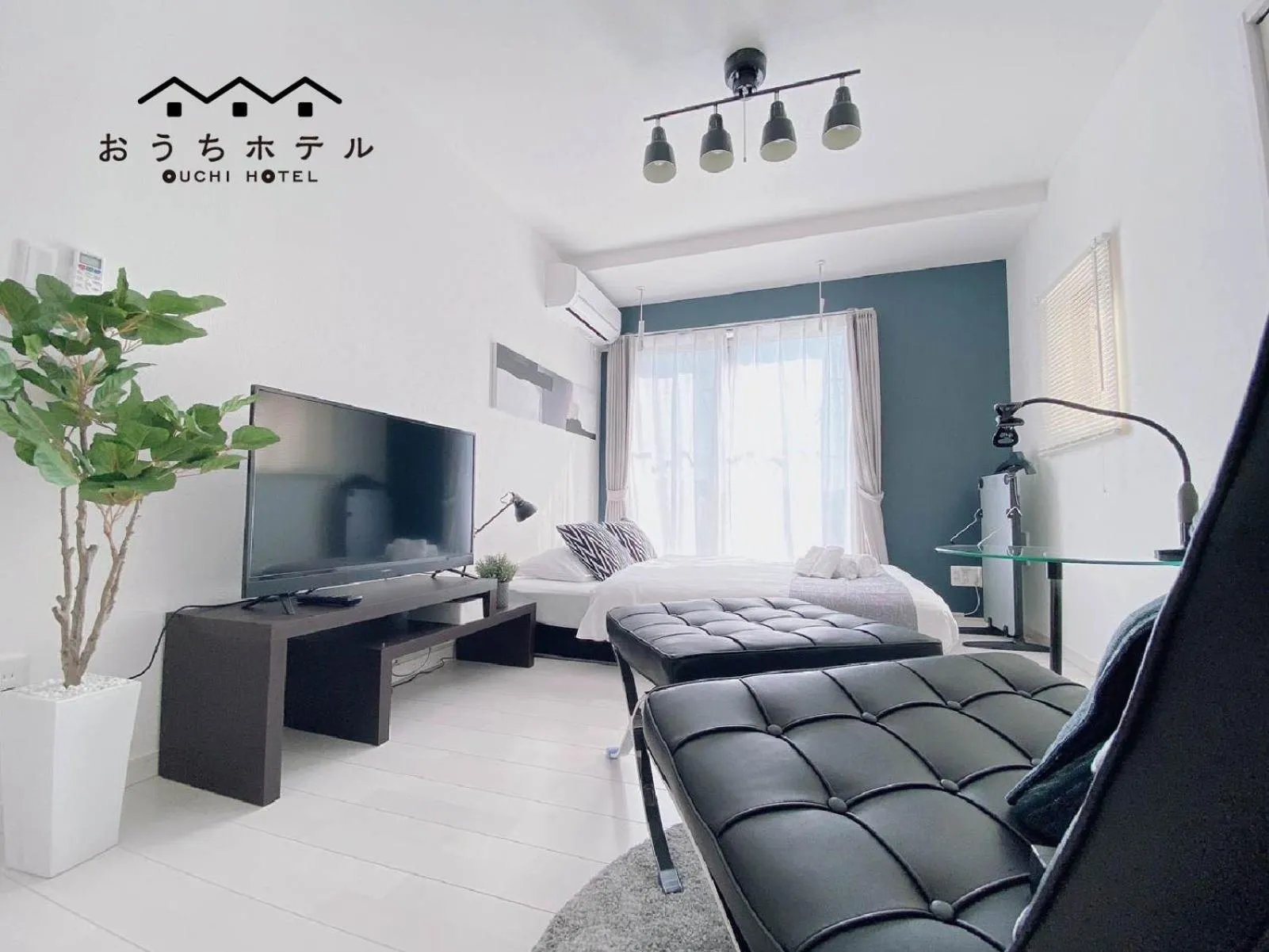 Bed in OUCHI HOTEL Hatsukaichi-Ekimae