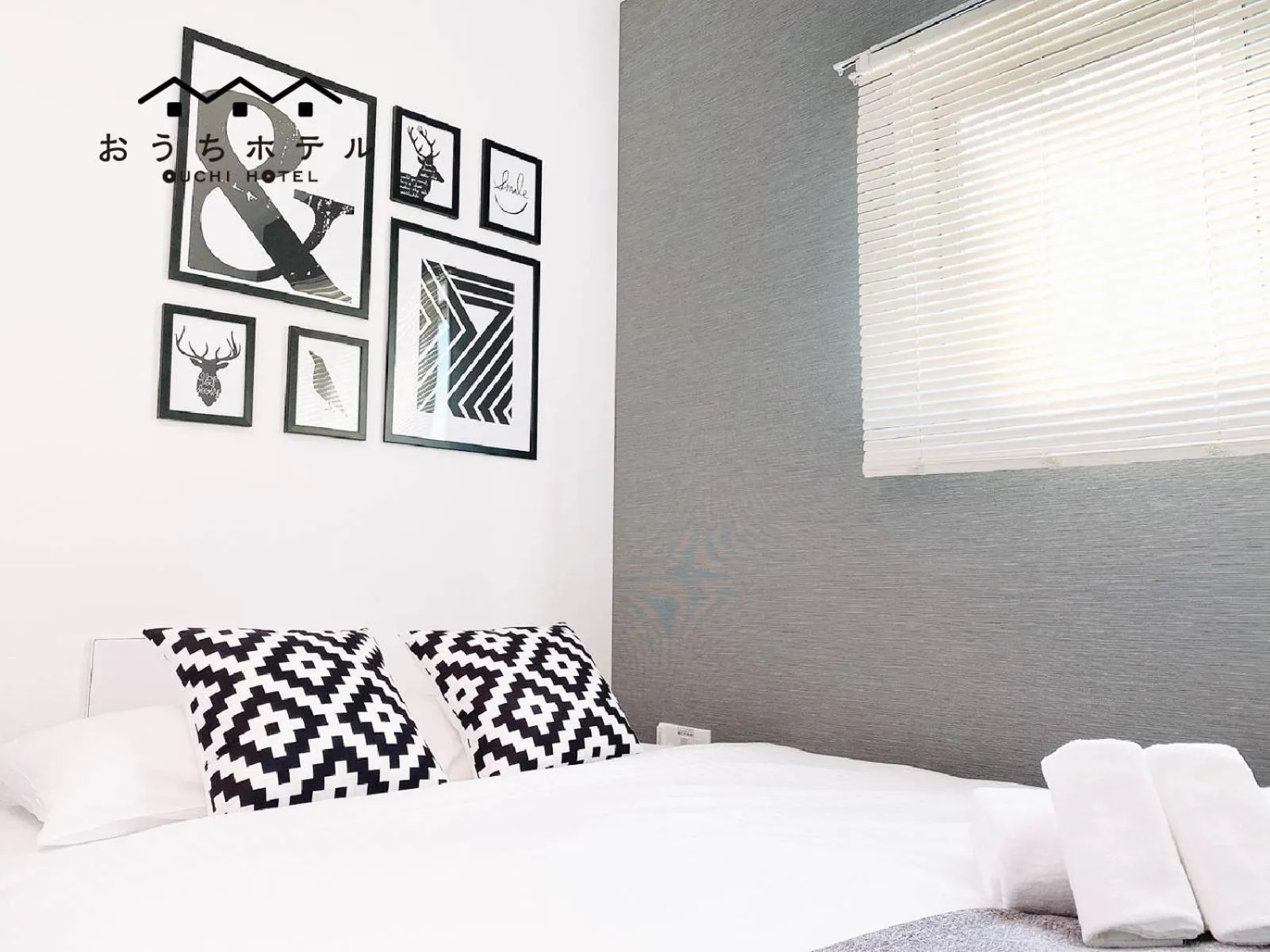 Bed in OUCHI HOTEL Hatsukaichi-Ekimae