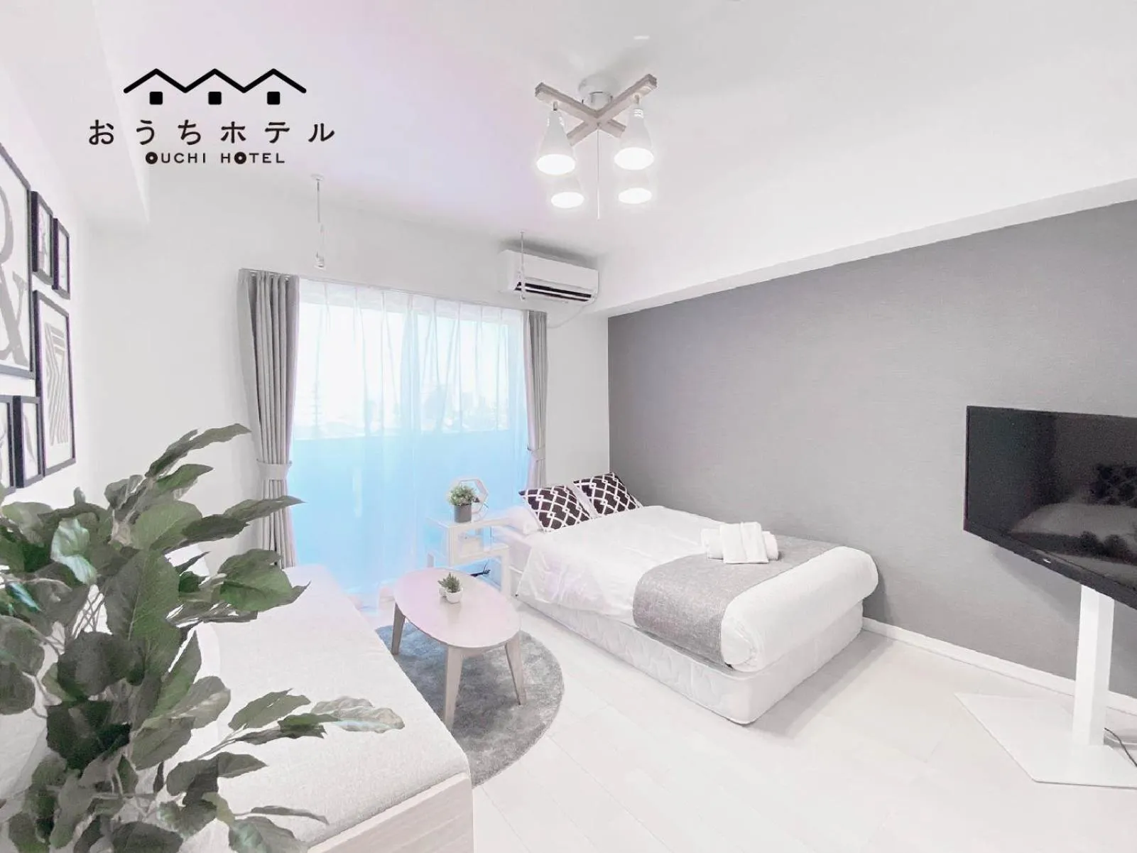 Bed in OUCHI HOTEL Hatsukaichi-Ekimae