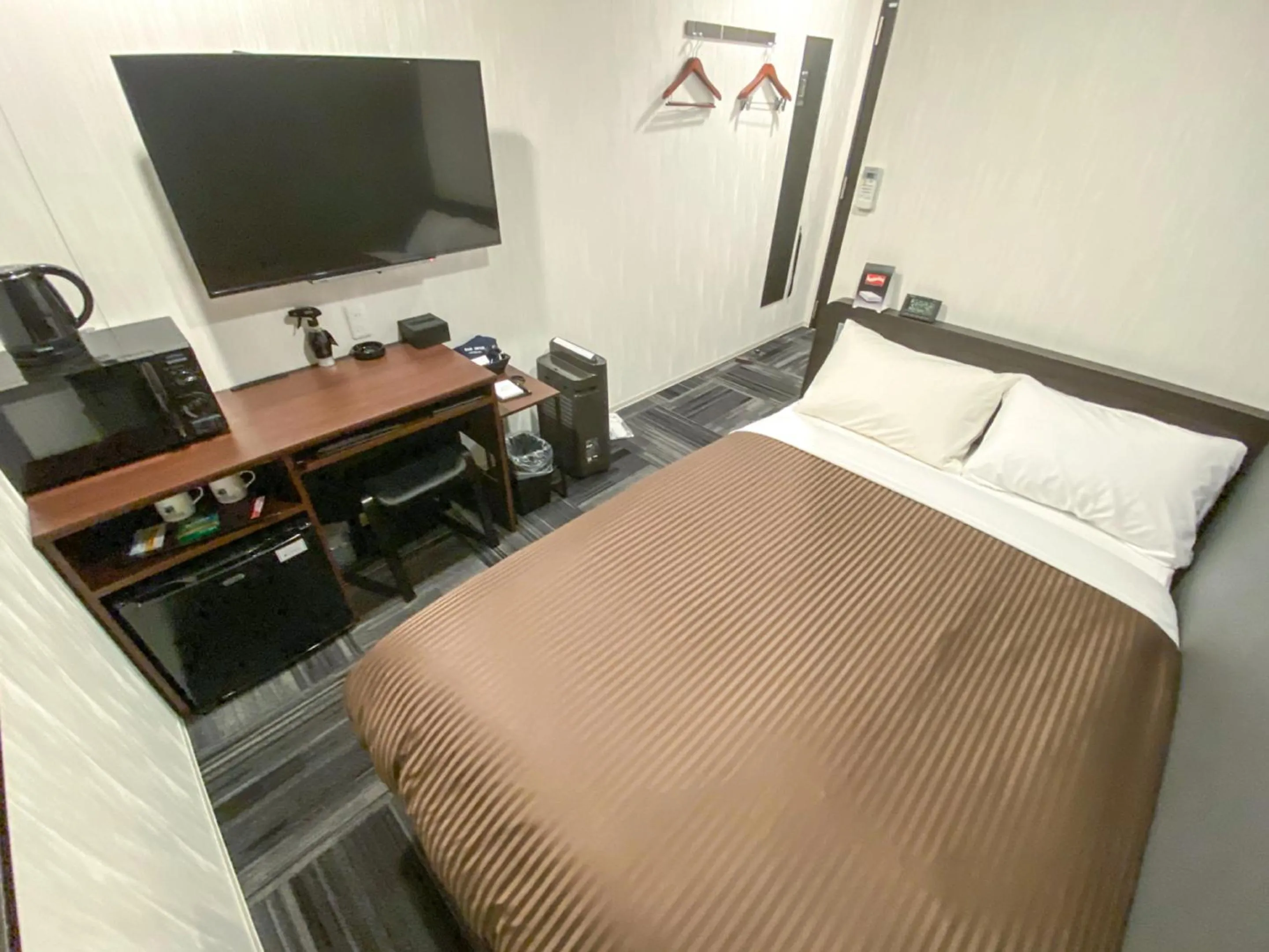 Photo of the whole room, Bed in HOTEL LiVEMAX Okayama Kurashiki Ekimae