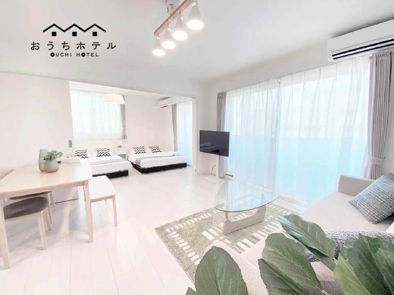 Bed in OUCHI HOTEL Miyajimaguchi