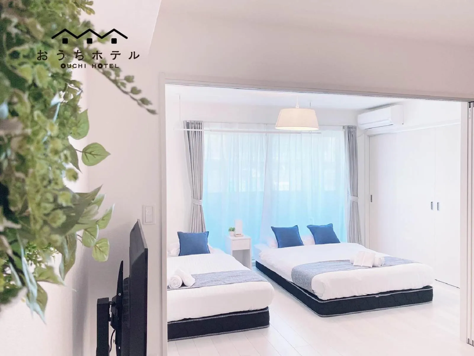 Bed in OUCHI HOTEL Miyajimaguchi