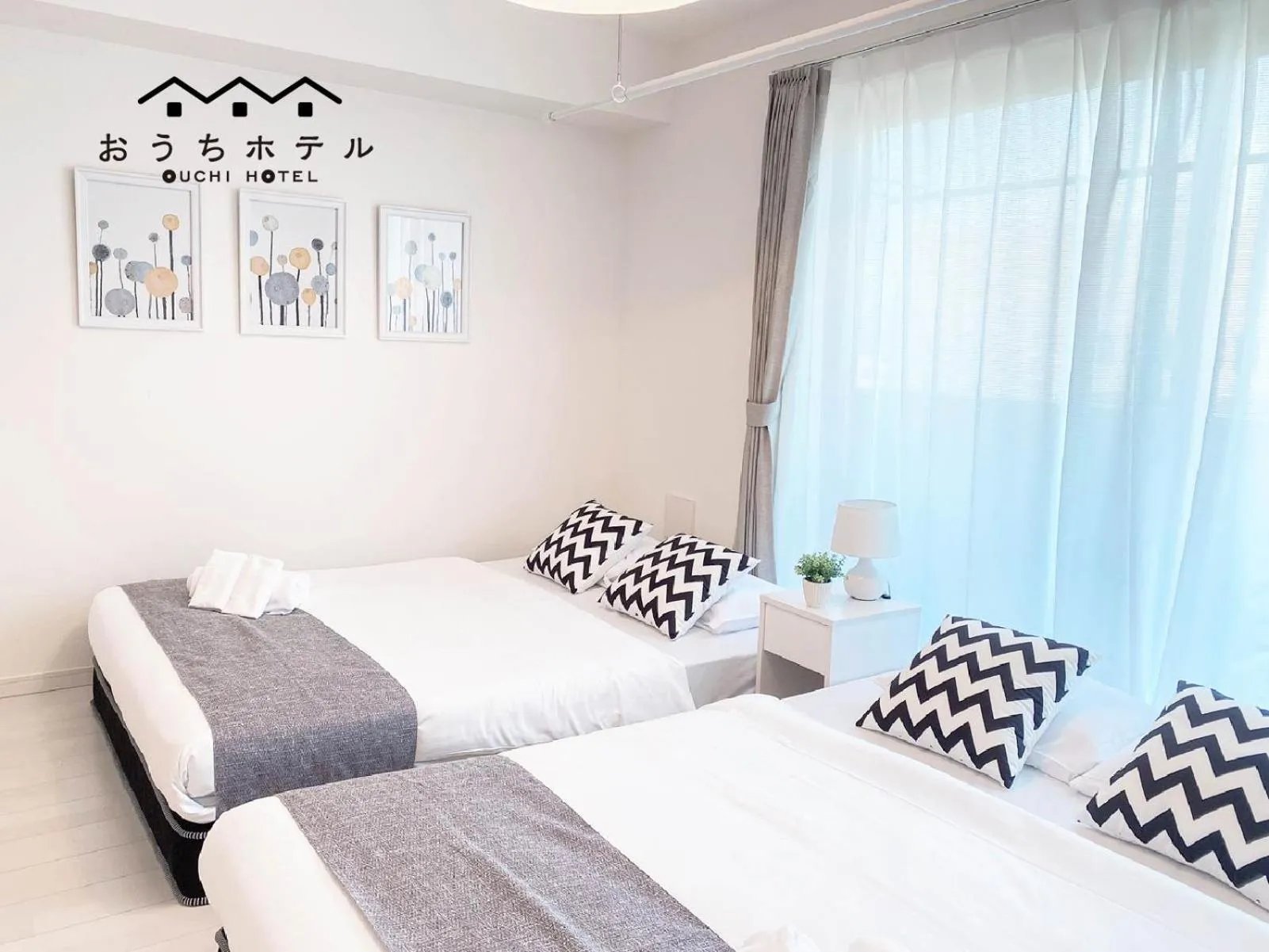 Bed in OUCHI HOTEL Miyajimaguchi