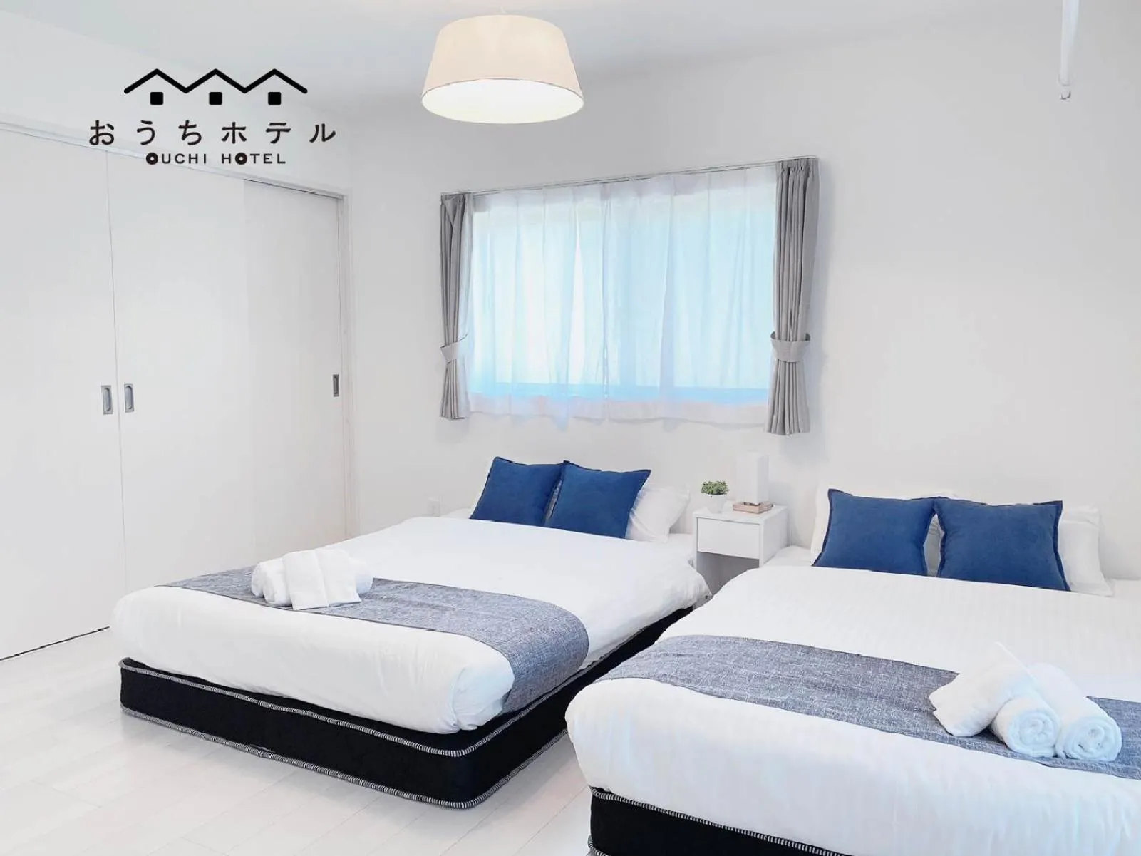 Bed in OUCHI HOTEL Miyajimaguchi