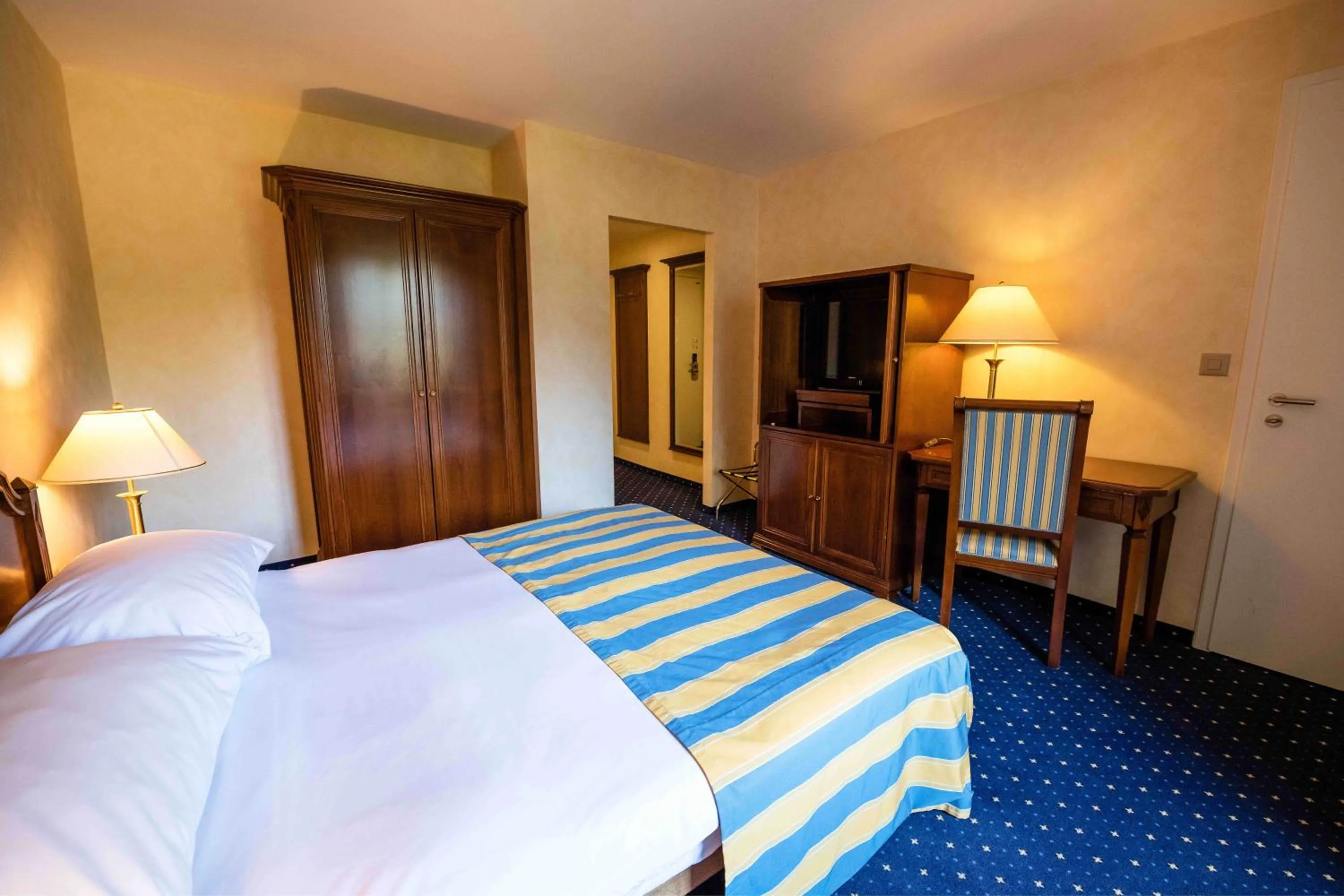 Bedroom, Bed in Grand Hotel et Centre Thermal d'Yverdon-les-Bains