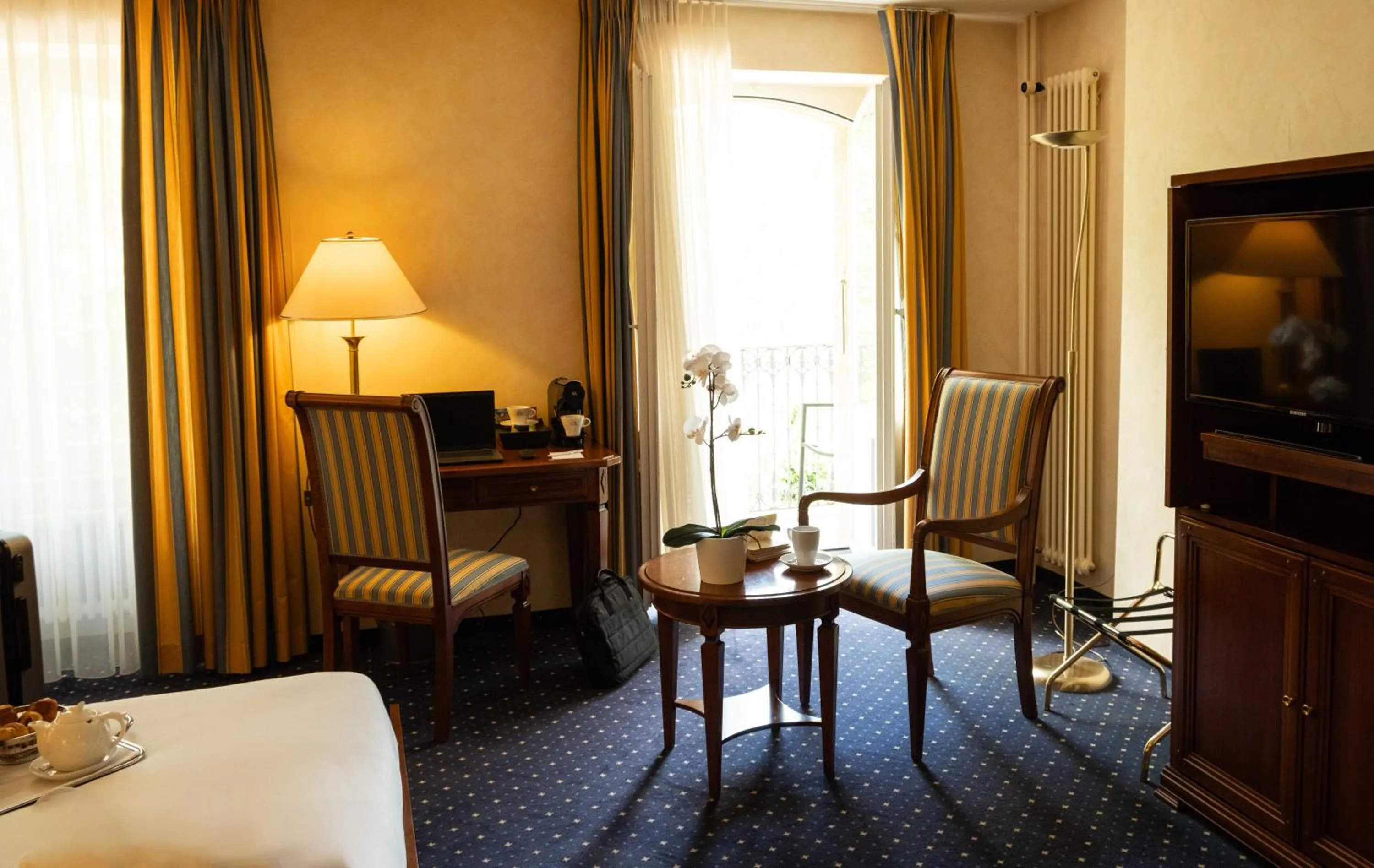 Seating area, Bed in Grand Hotel et Centre Thermal d'Yverdon-les-Bains