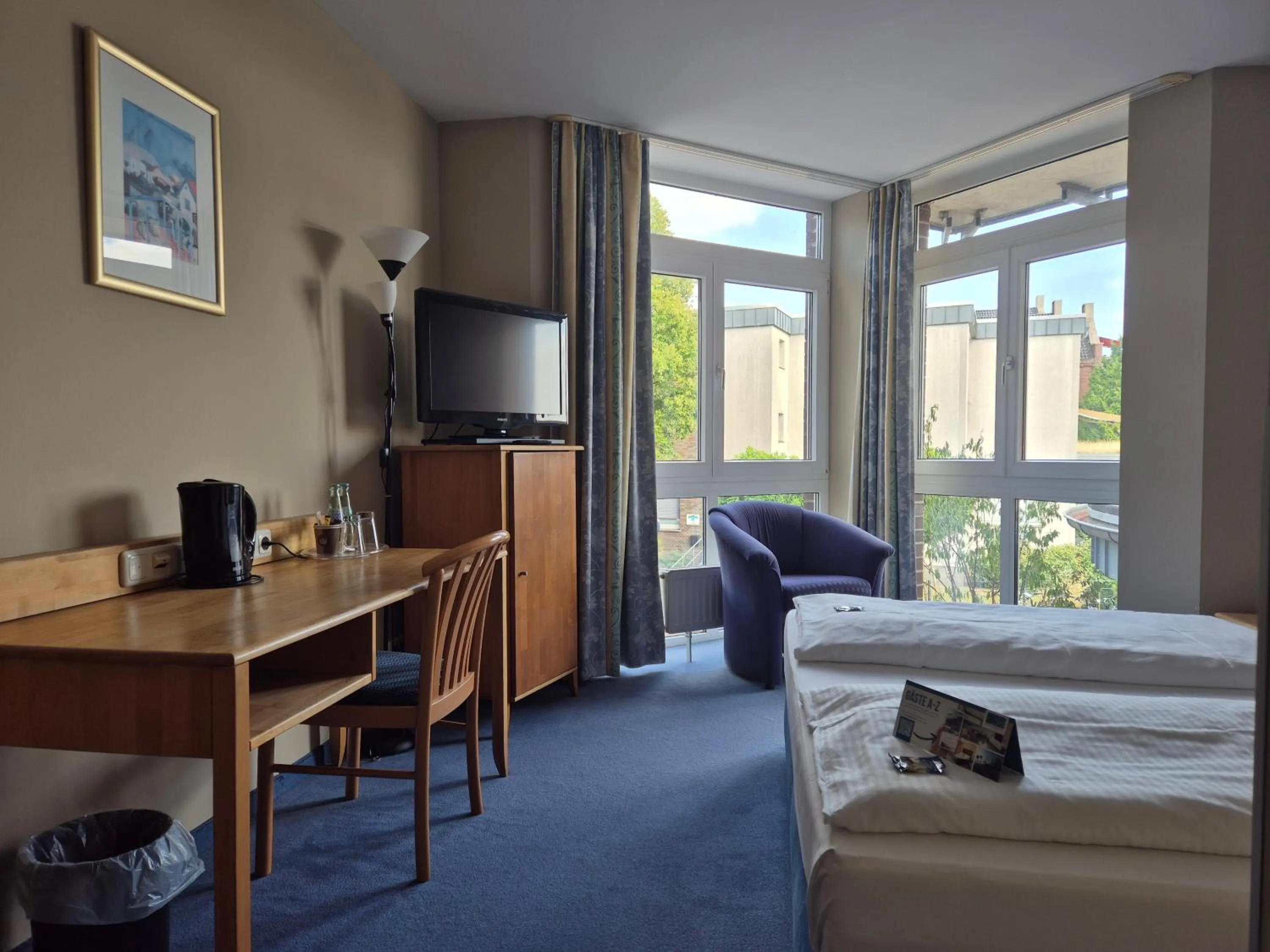 Photo of the whole room, Bed in Hotel Rheinpark Rees