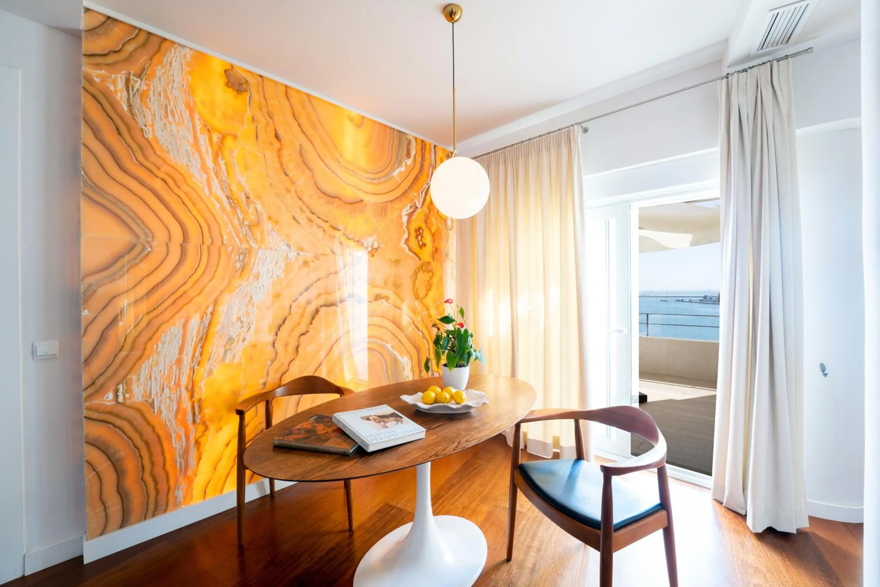 Dining area in Plaza Mina Suites - Adults Recommended by Luxury Suites Cadiz