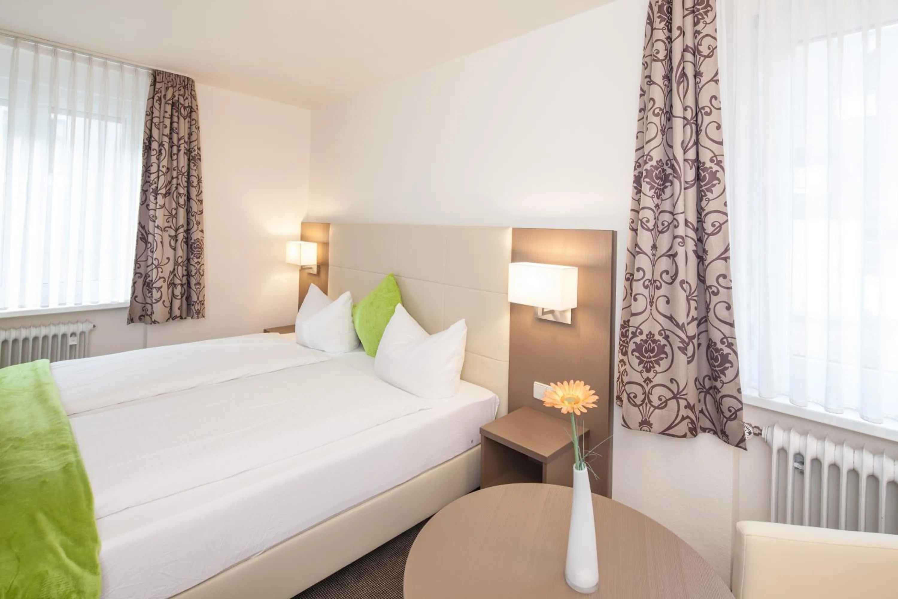 Photo of the whole room, Bed in City Hotel Freiburg