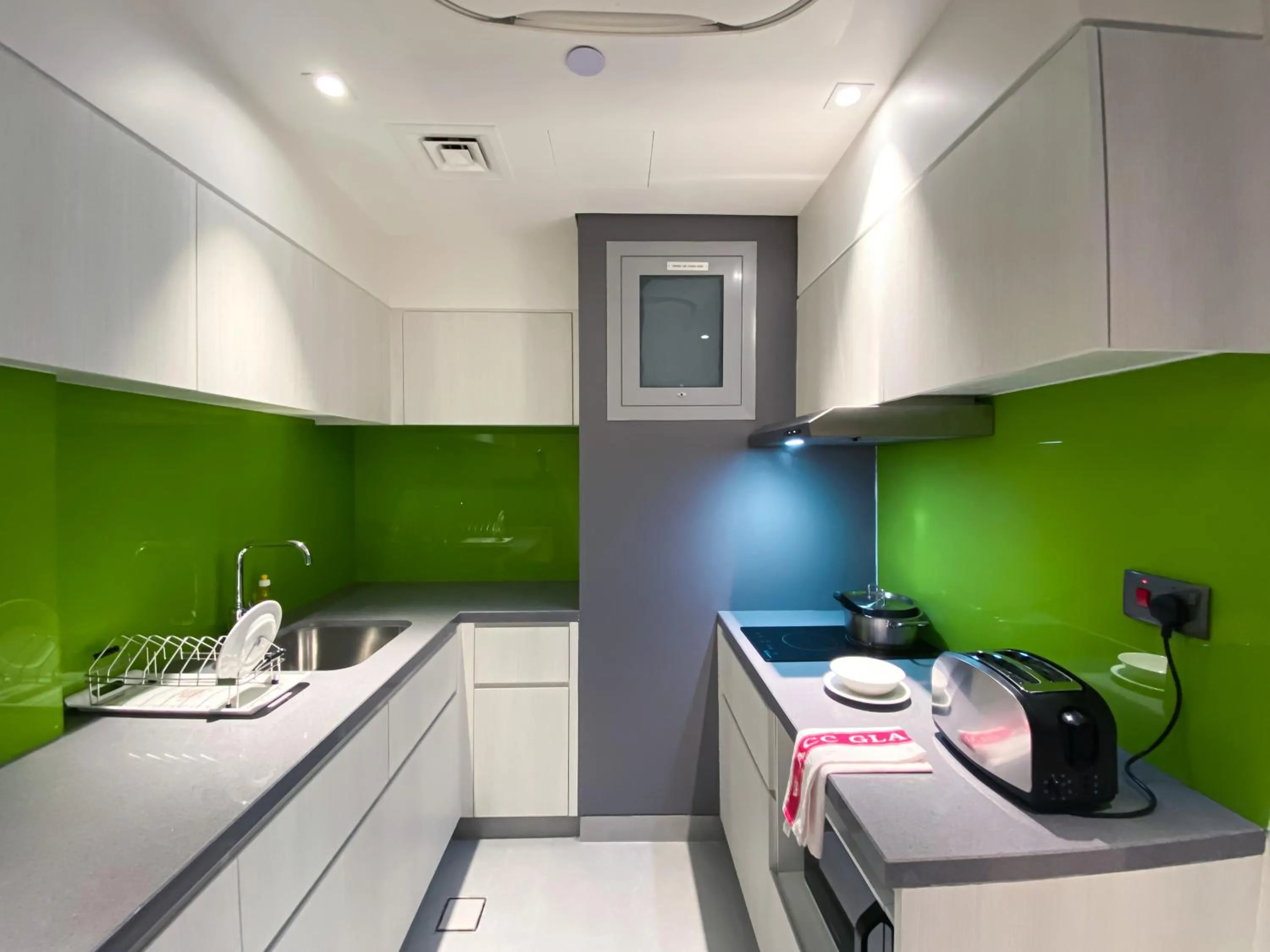 Kitchen or kitchenette in Citadines Al Ghubrah Muscat