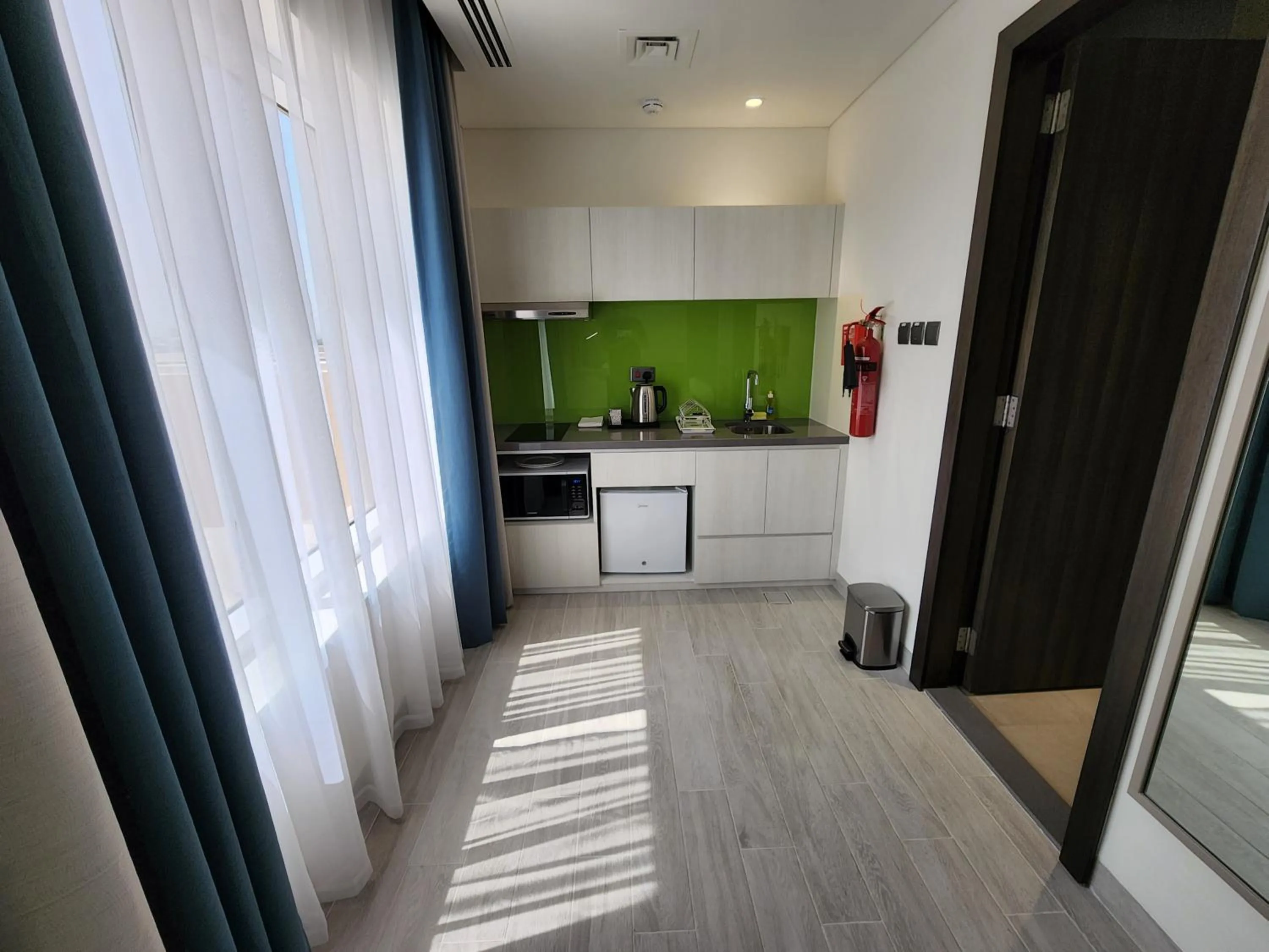 Kitchen or kitchenette in Citadines Al Ghubrah Muscat