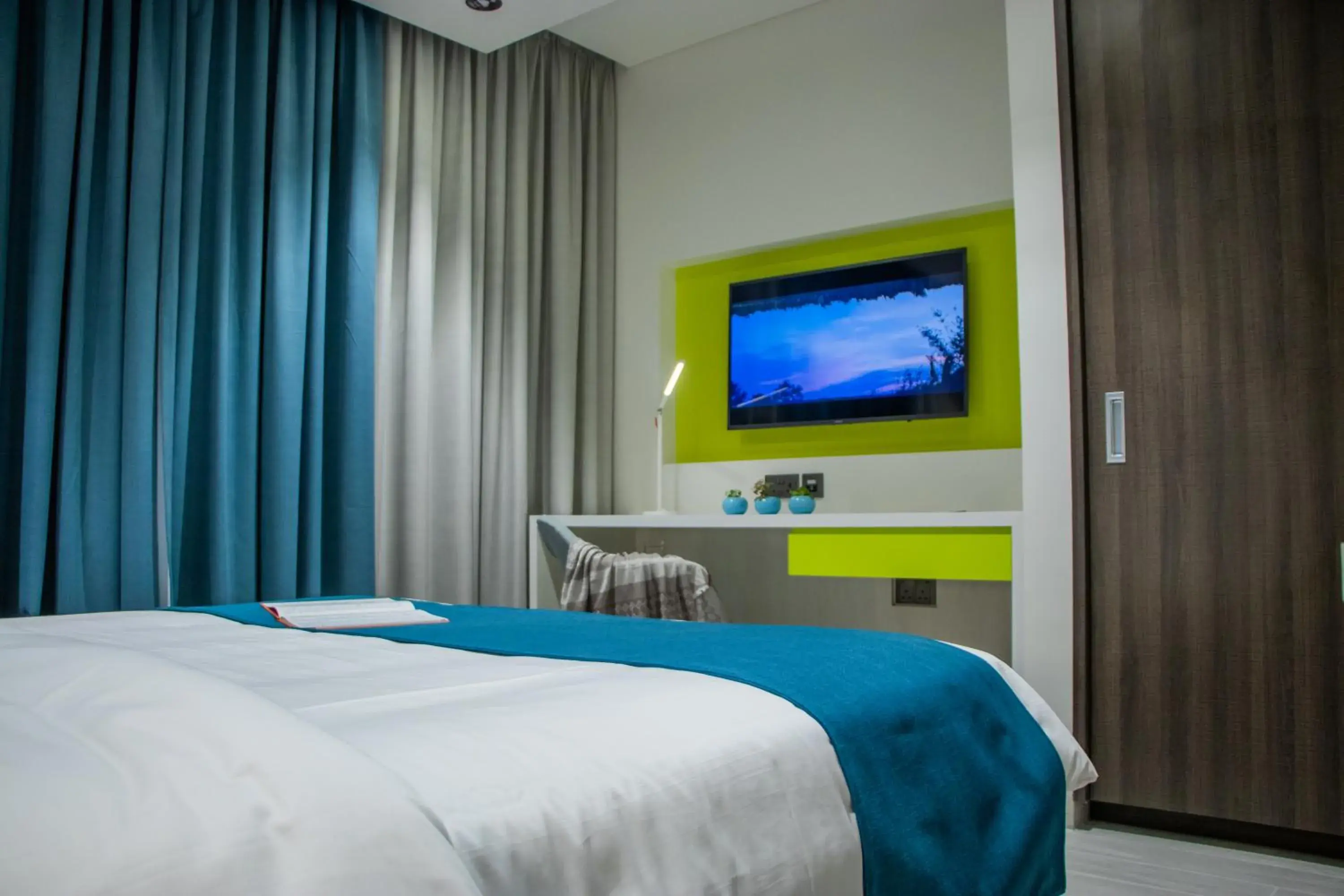 TV and multimedia, Bed in Citadines Al Ghubrah Muscat TV and multimedia, Bed in Citadines Al Ghubrah Muscat
