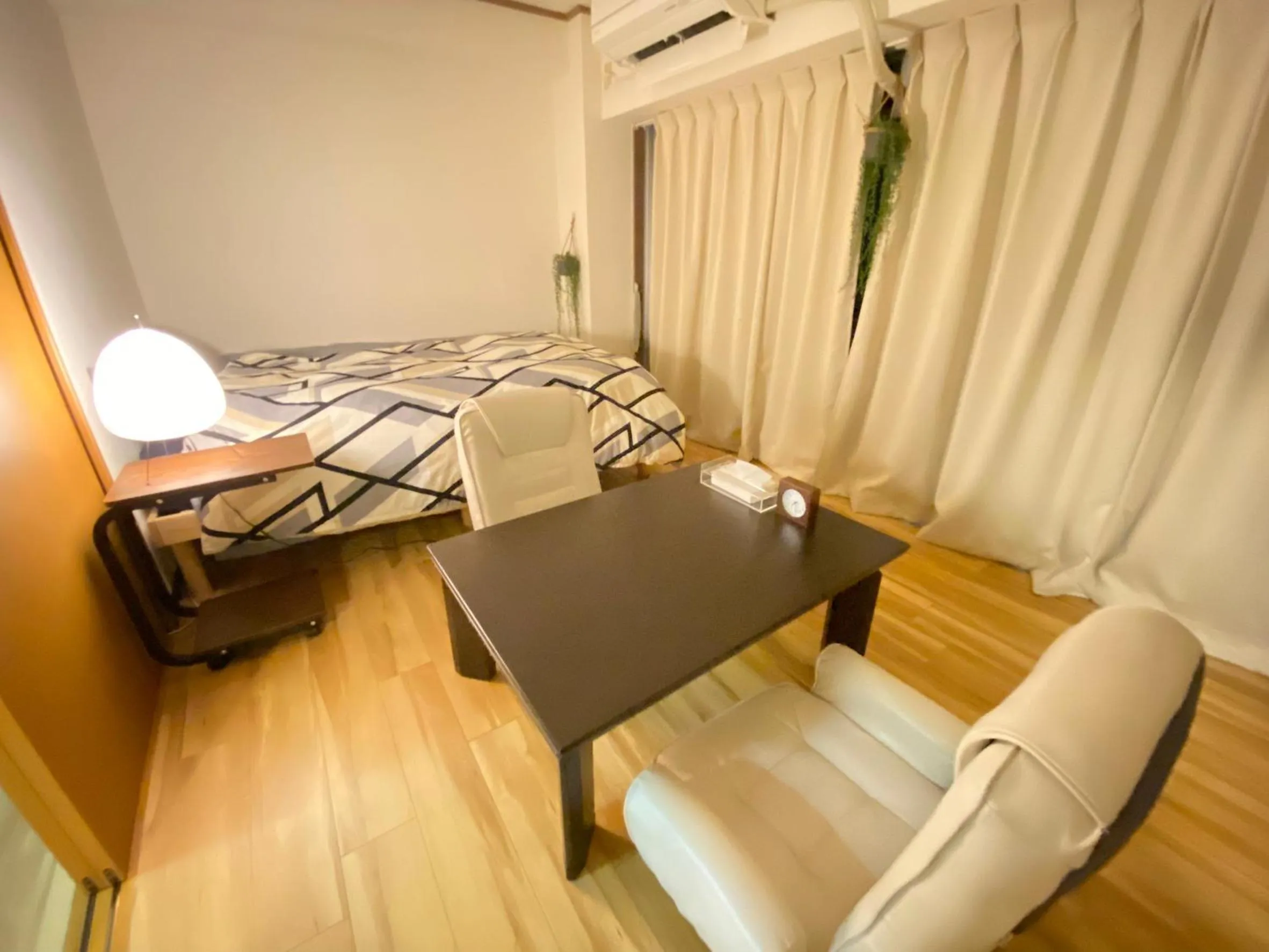 Bed in Yoyogi Apartment 2-401 by Tranova