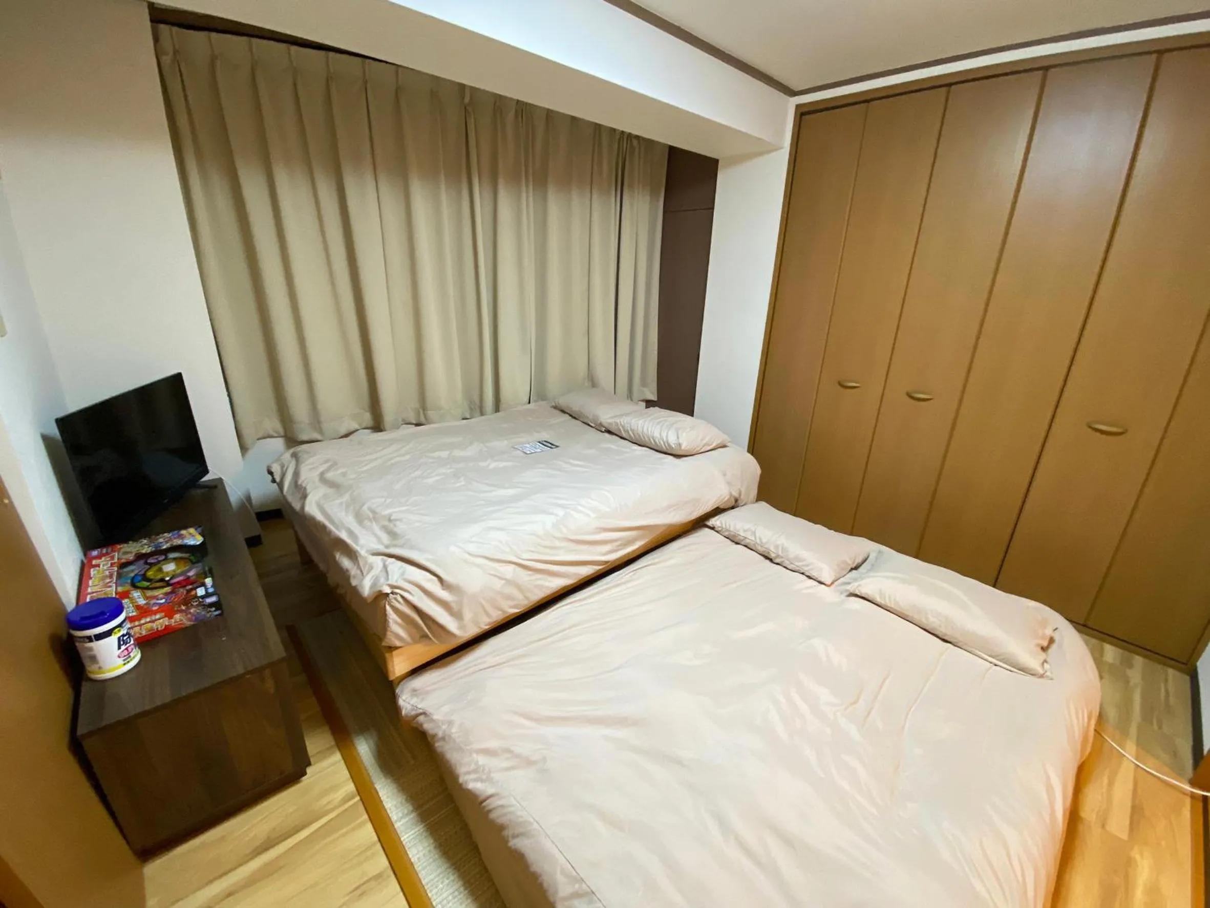 Bed in Yoyogi Apartment 2-401 by Tranova