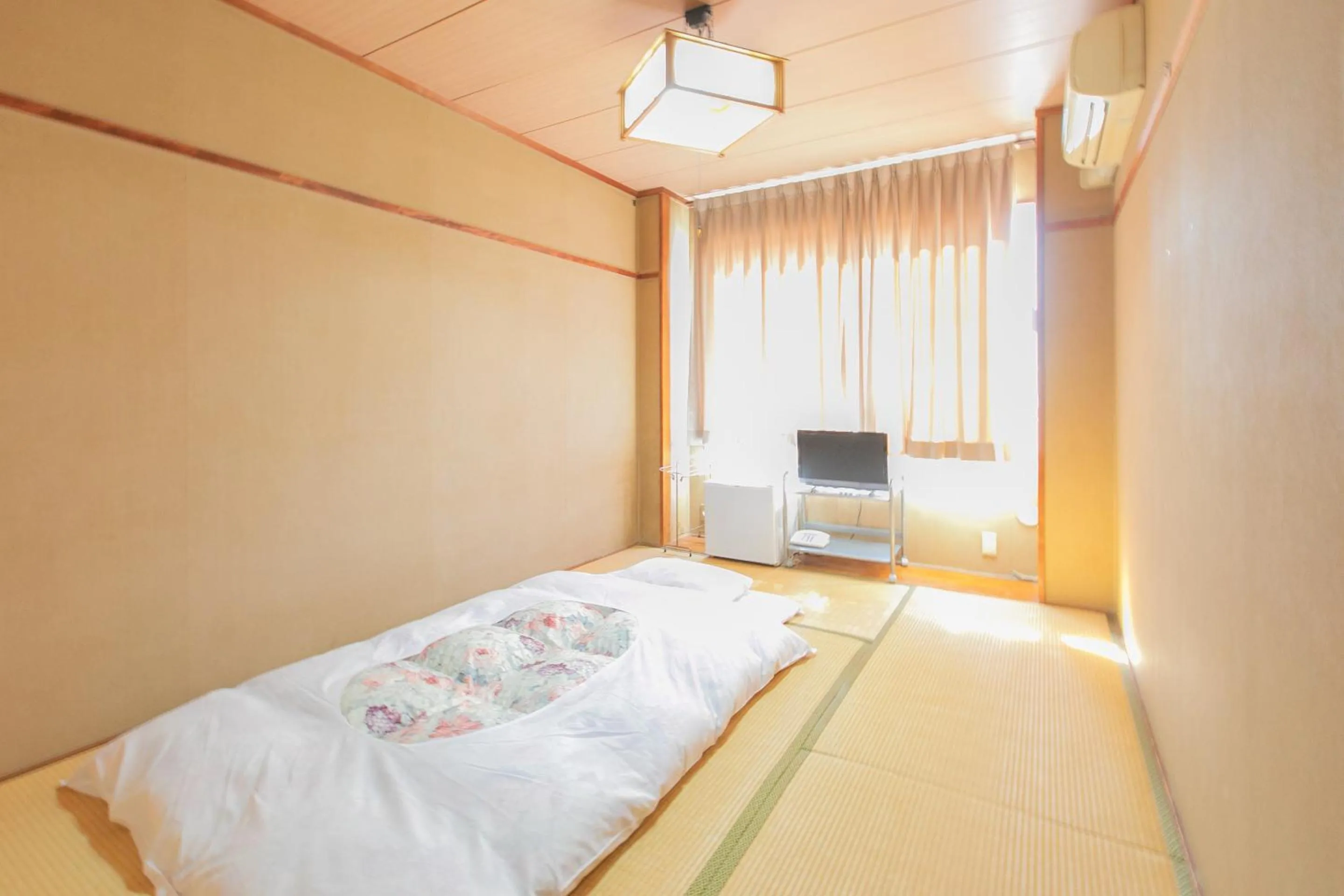 Photo of the whole room, Bed in Tabist Setouchinoyado Takehara Seaside
