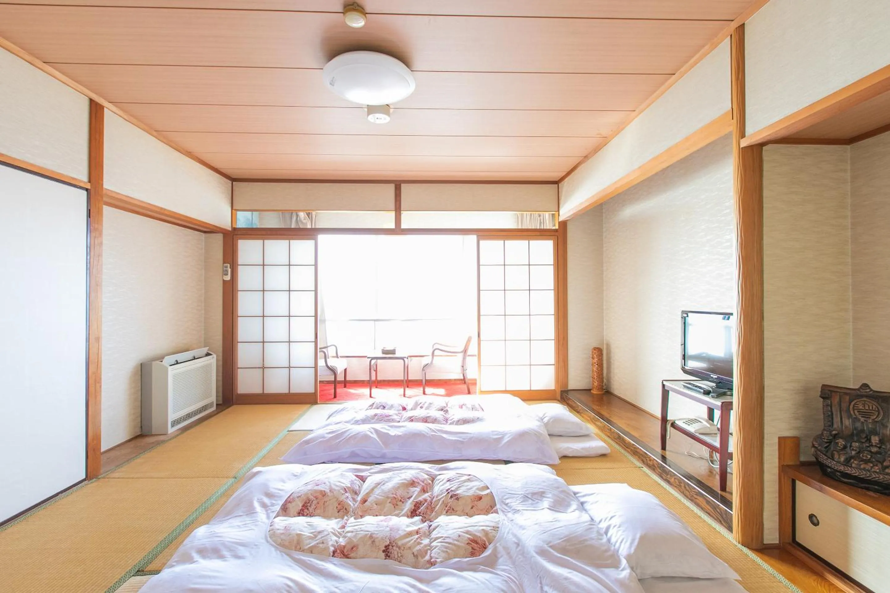 Photo of the whole room, Bed in Tabist Setouchinoyado Takehara Seaside