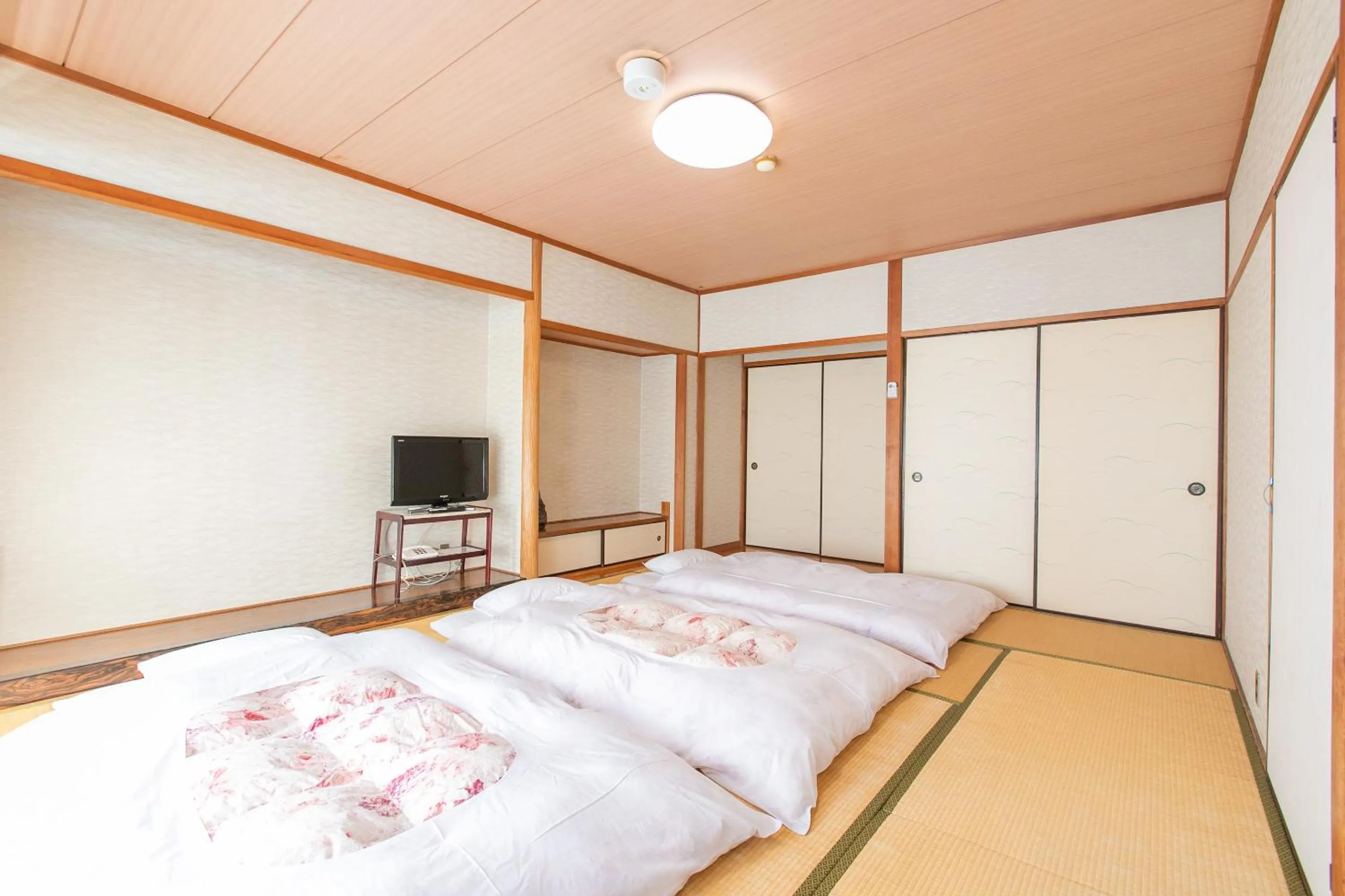 Photo of the whole room, Bed in Tabist Setouchinoyado Takehara Seaside