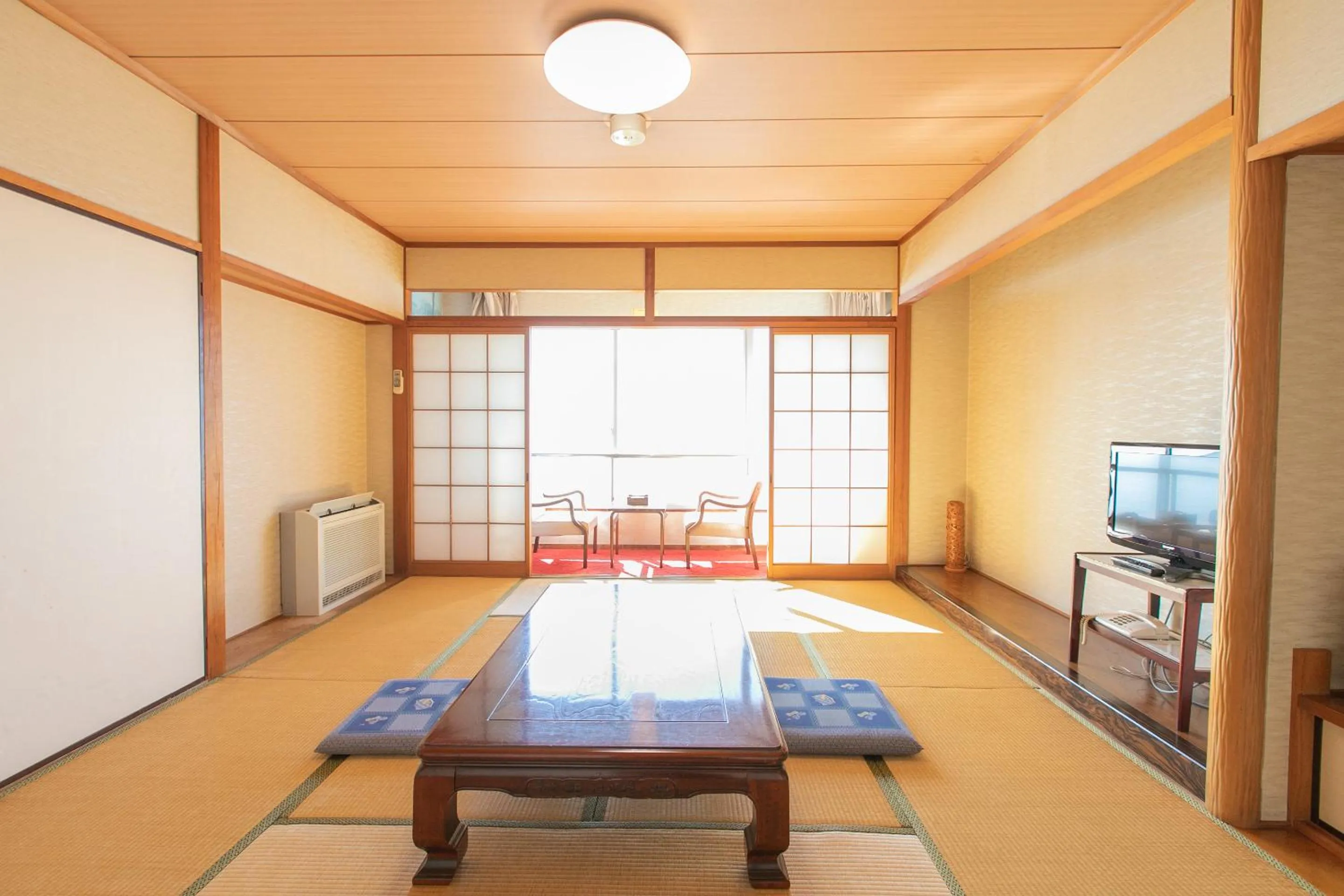 Photo of the whole room in Tabist Setouchinoyado Takehara Seaside