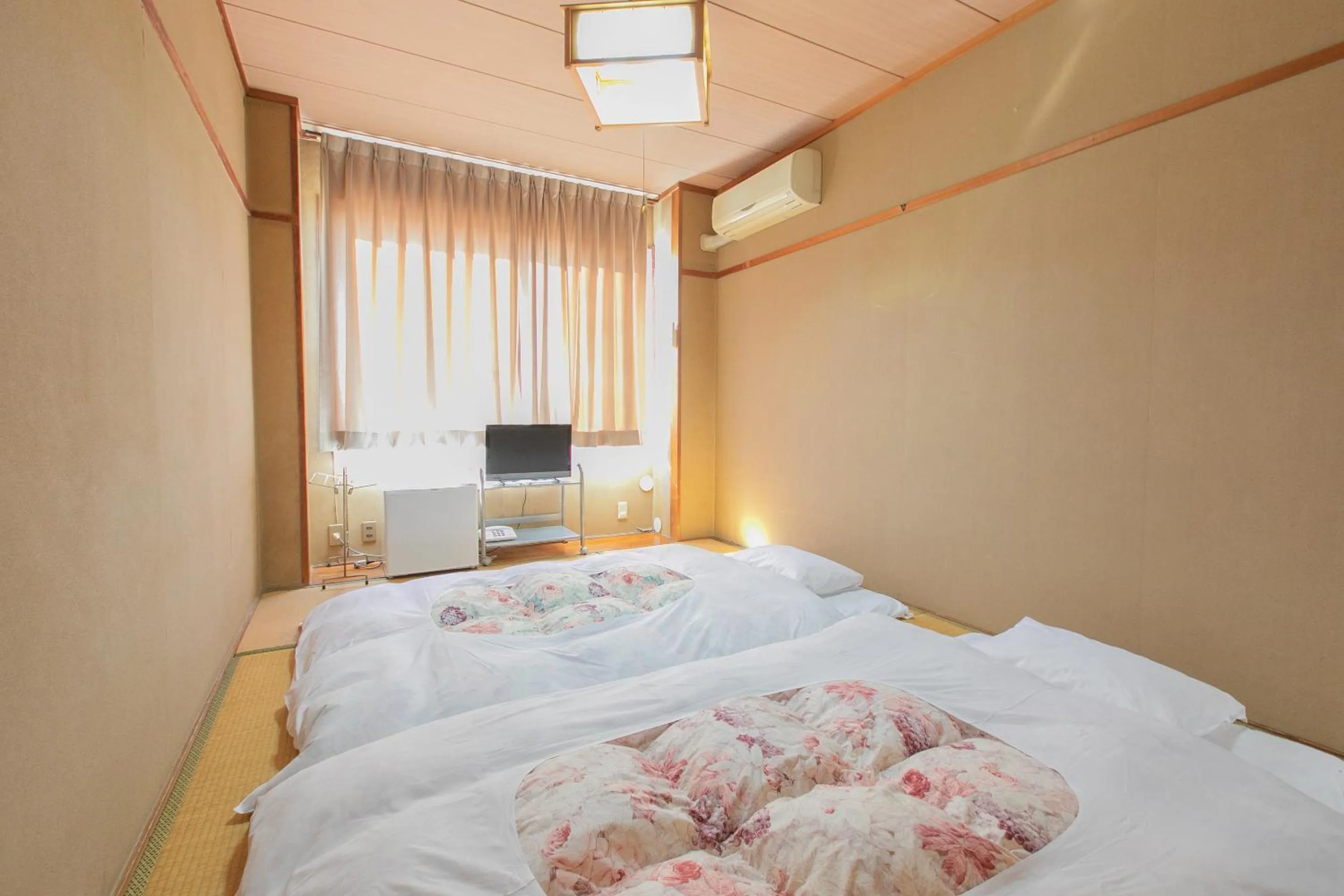 Photo of the whole room, Bed in Tabist Setouchinoyado Takehara Seaside